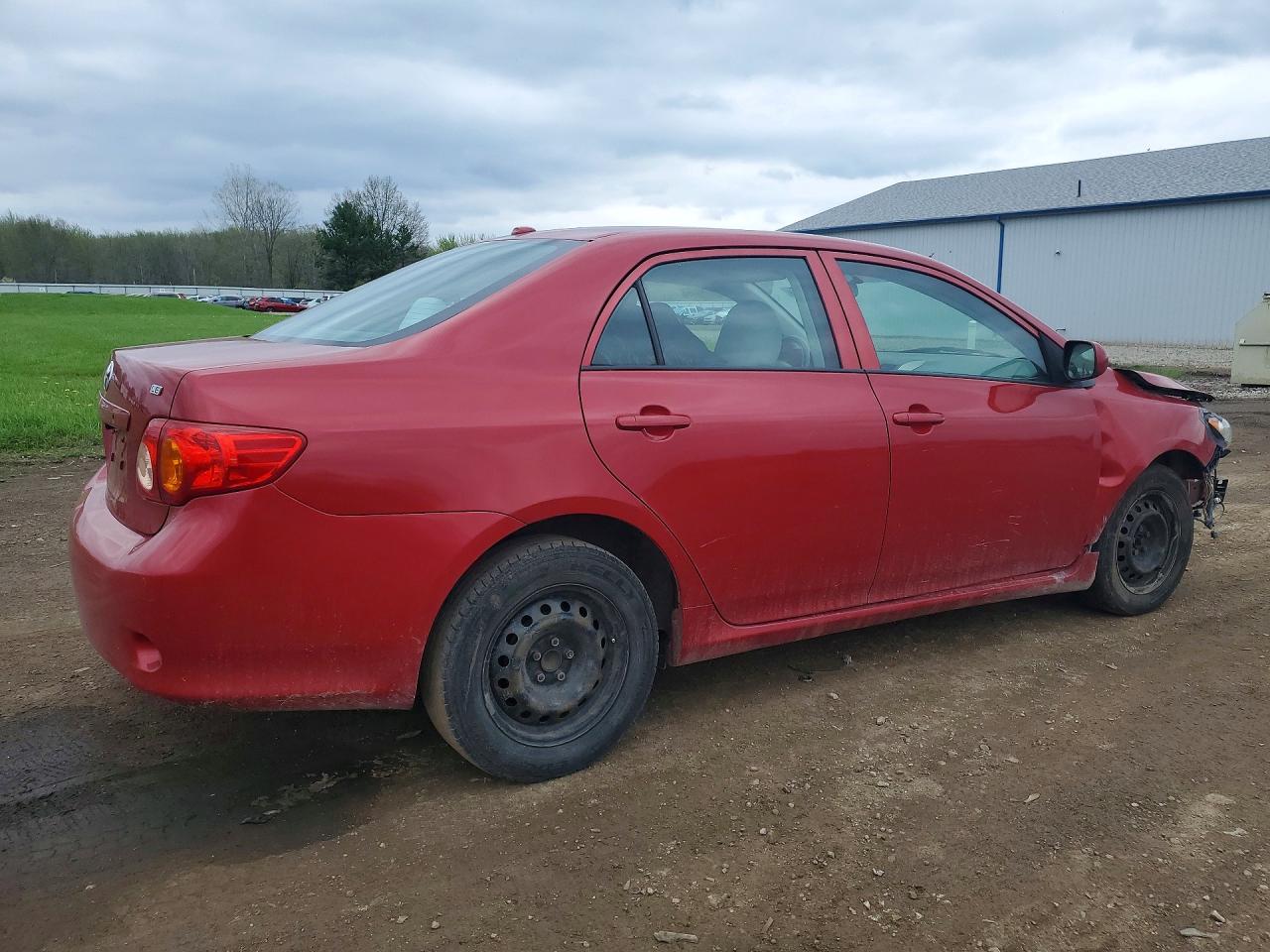 2009 Toyota Corolla Le Red vin: 2T1BU40EX9C111755