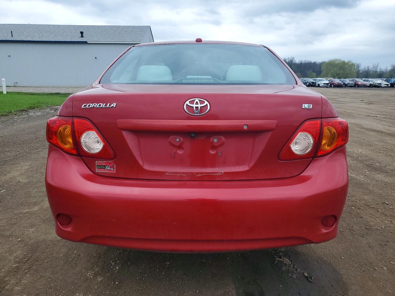 2009 Toyota Corolla Le Red vin: 2T1BU40EX9C111755