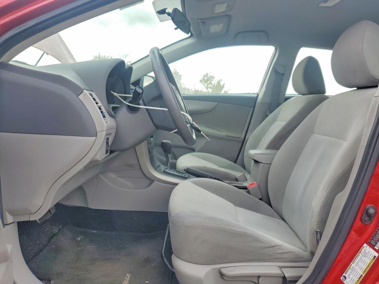 2009 Toyota Corolla Le Red vin: 2T1BU40EX9C111755