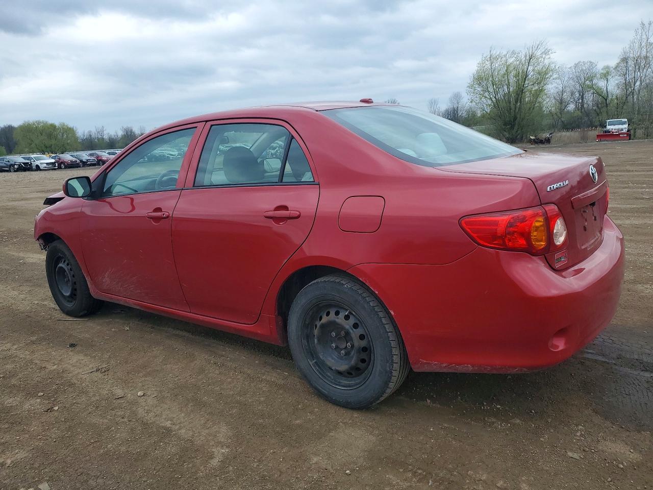 2009 Toyota Corolla Le Red vin: 2T1BU40EX9C111755