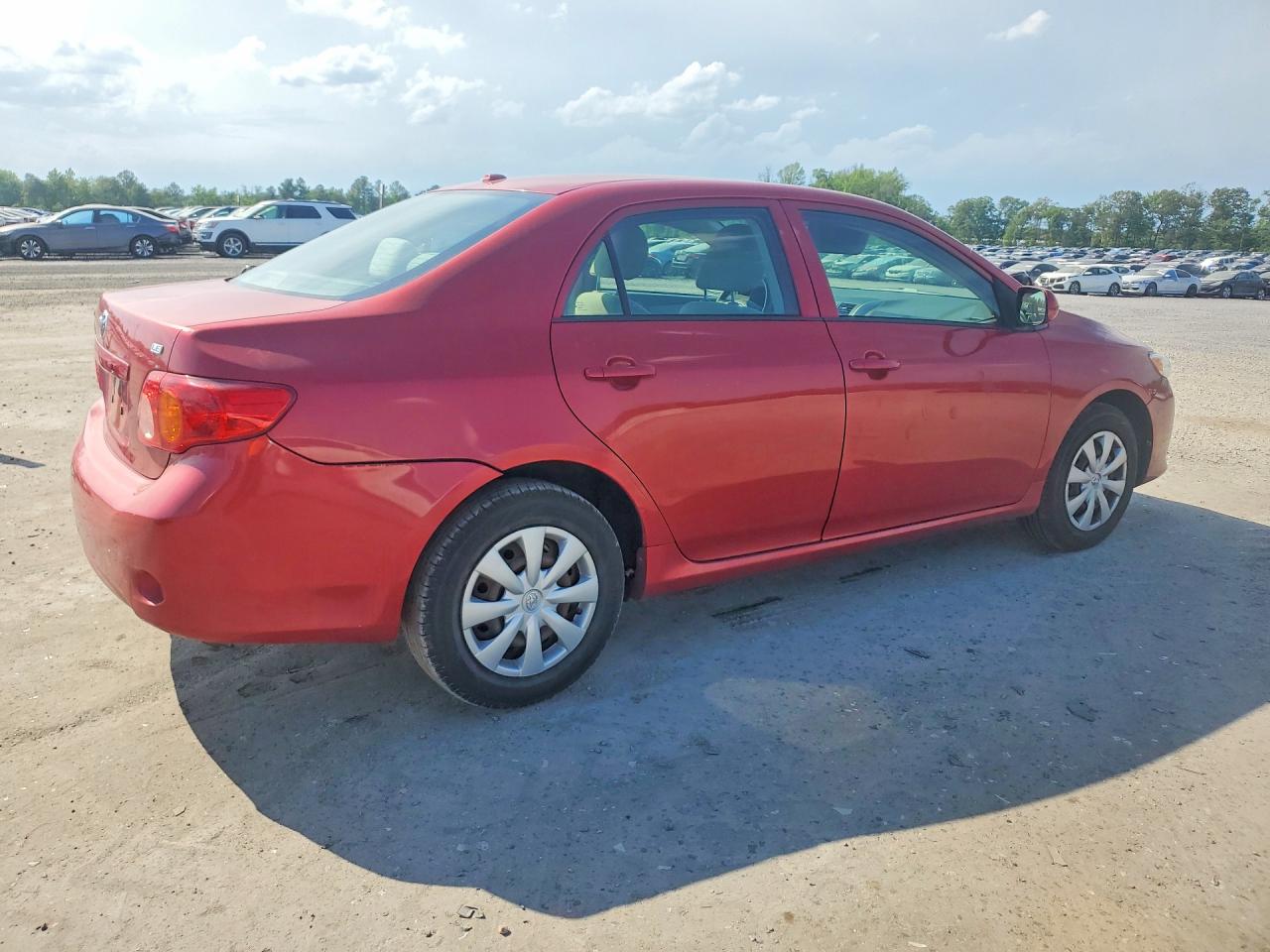 2009 Toyota Corolla Le Красный vin: 2T1BU40EX9C121587