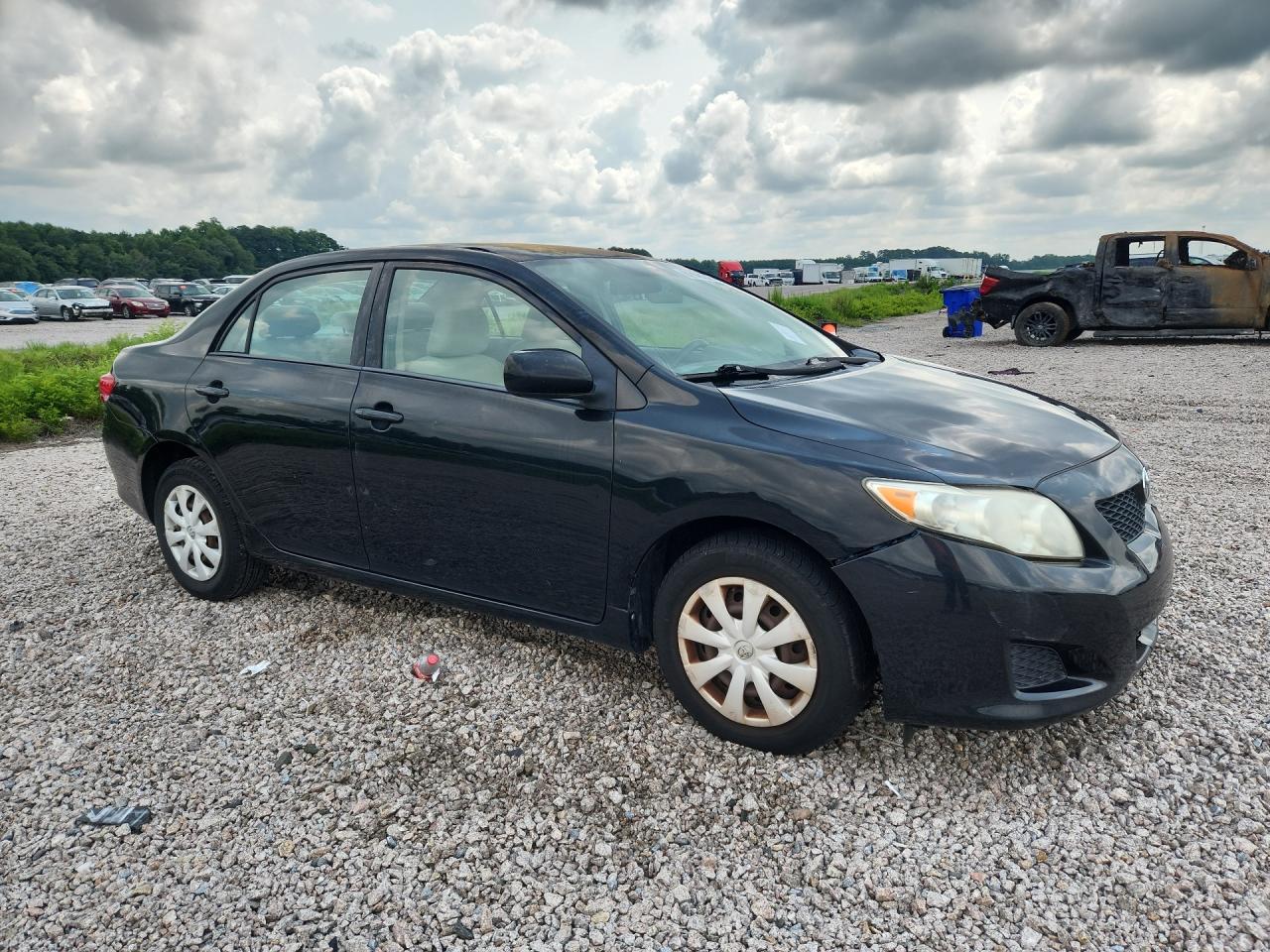 2009 Toyota Corolla Le Black vin: 2T1BU40EX9C142004