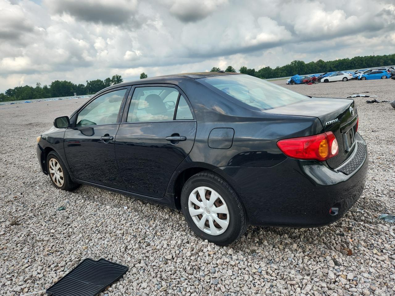 2009 Toyota Corolla Le Black vin: 2T1BU40EX9C142004