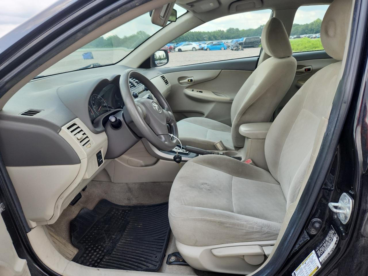 2009 Toyota Corolla Le Black vin: 2T1BU40EX9C142004