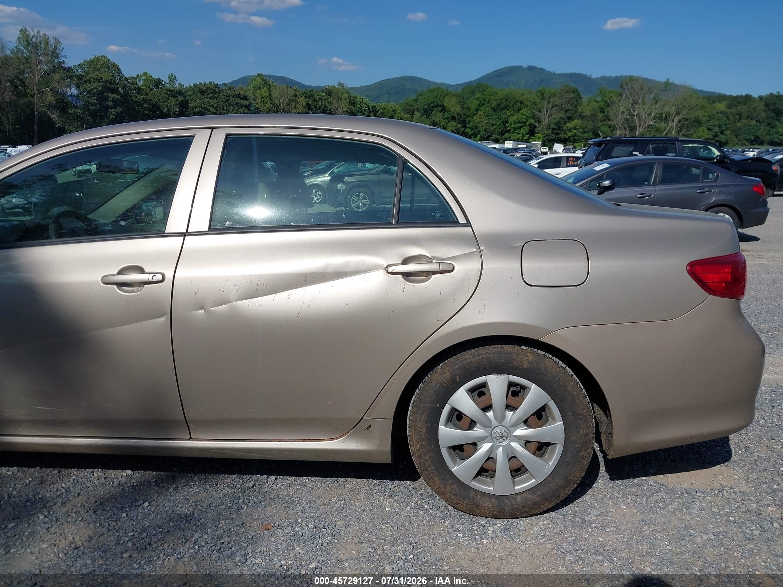 2009 Toyota Corolla Le Gold vin: 2T1BU40EX9C152533