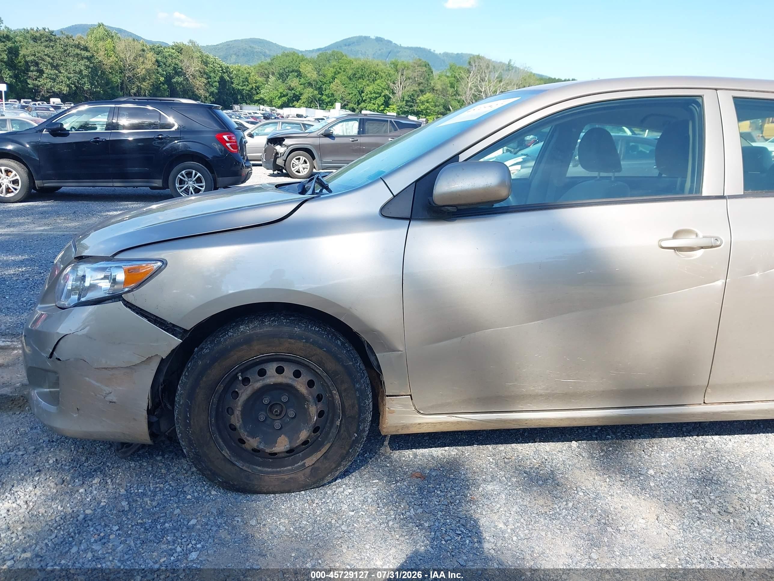 2009 Toyota Corolla Le Gold vin: 2T1BU40EX9C152533