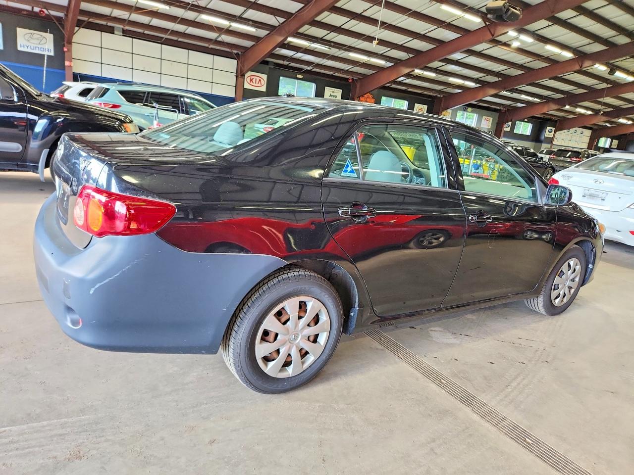 2009 Toyota Corolla Base Black vin: 2T1BU40EX9C169896
