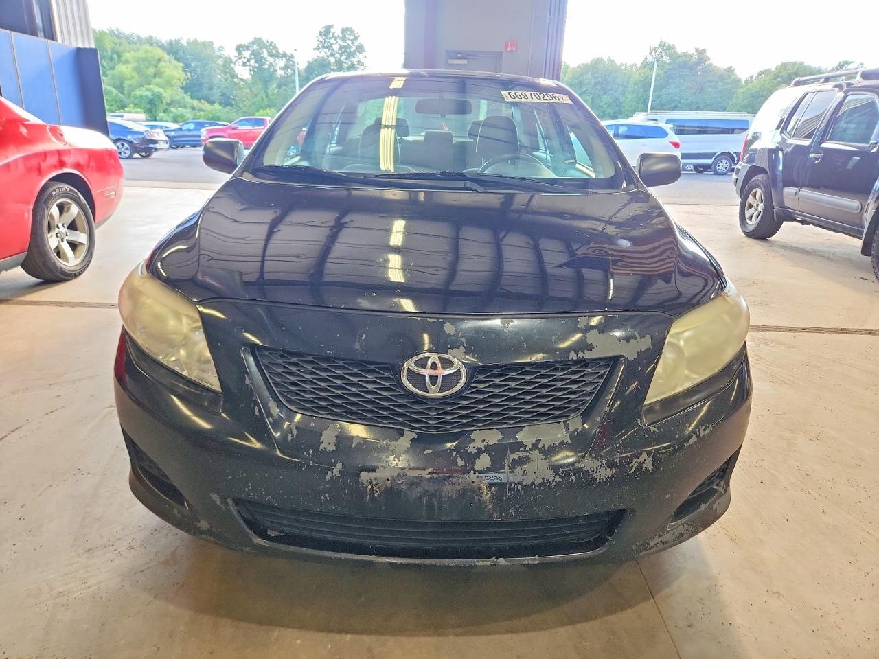 2009 Toyota Corolla Base Black vin: 2T1BU40EX9C169896
