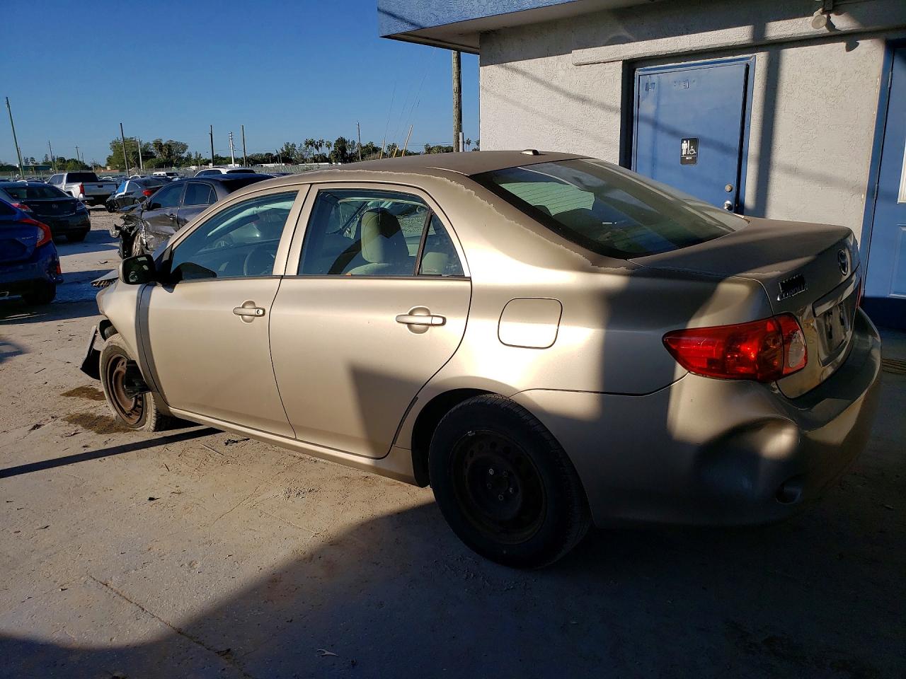 2009 Toyota Corolla Le Gold vin: 2T1BU40EX9C183166