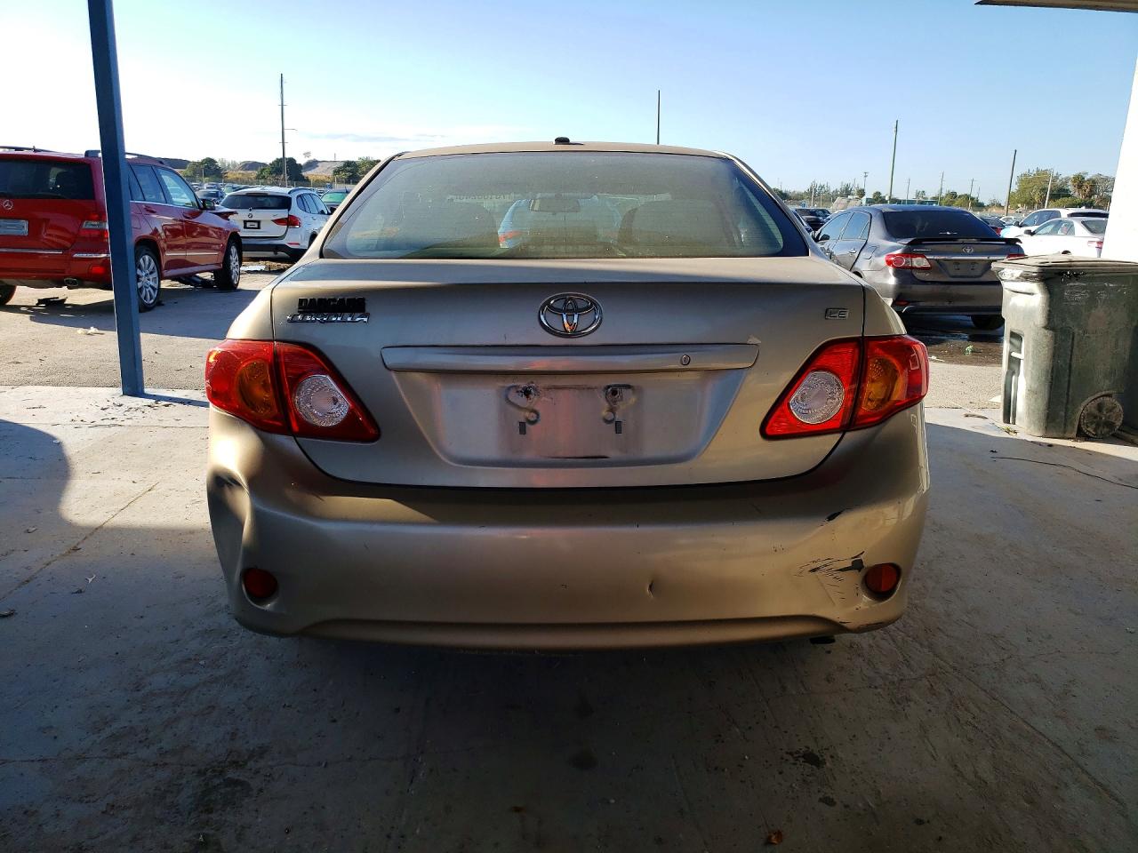 2009 Toyota Corolla Le Gold vin: 2T1BU40EX9C183166