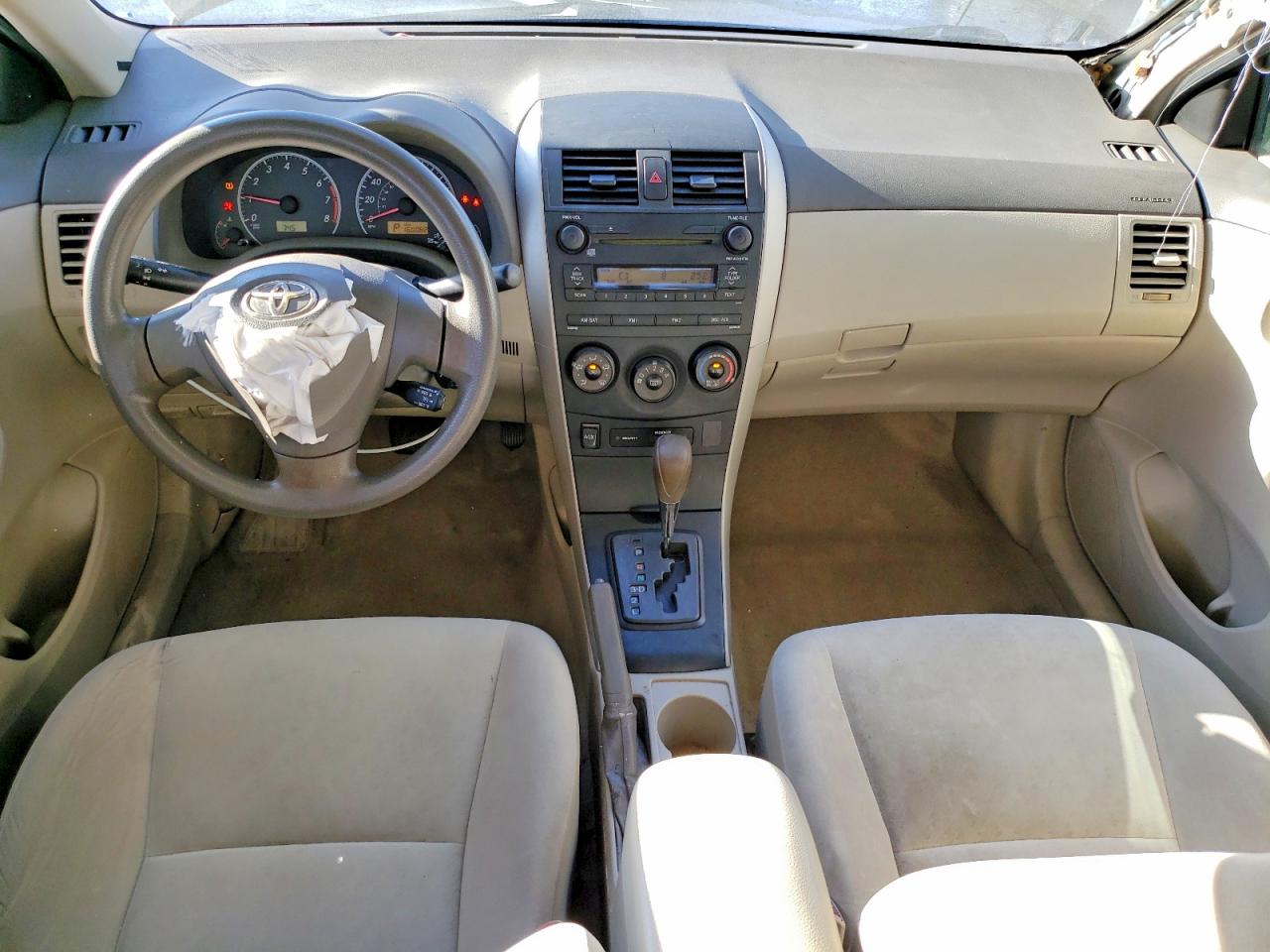 2009 Toyota Corolla Le Gold vin: 2T1BU40EX9C183166