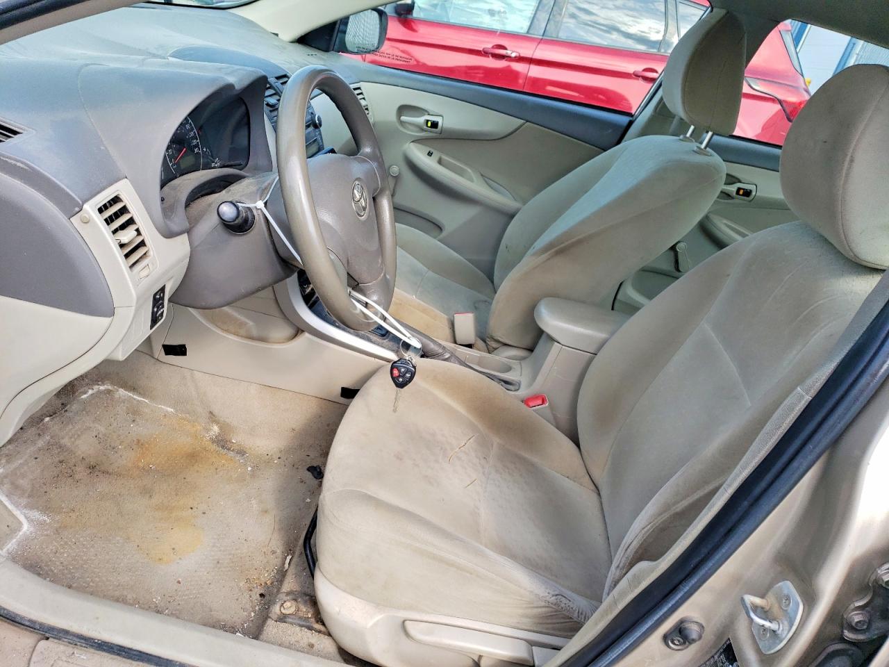 2010 Toyota Corolla Base Tan vin: 2T1BU4EE0AC329670