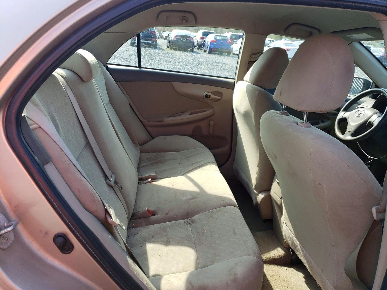 2010 Toyota Corolla Base Tan vin: 2T1BU4EE0AC329670