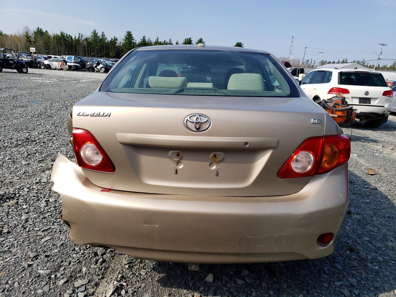 2010 Toyota Corolla Base Tan vin: 2T1BU4EE0AC329670