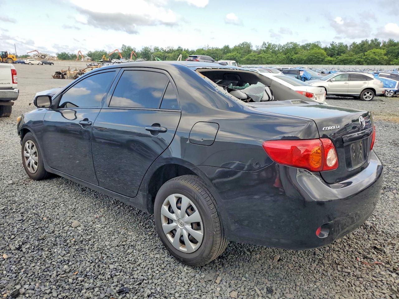 2010 Toyota Corolla Le Black vin: 2T1BU4EE0AC389495
