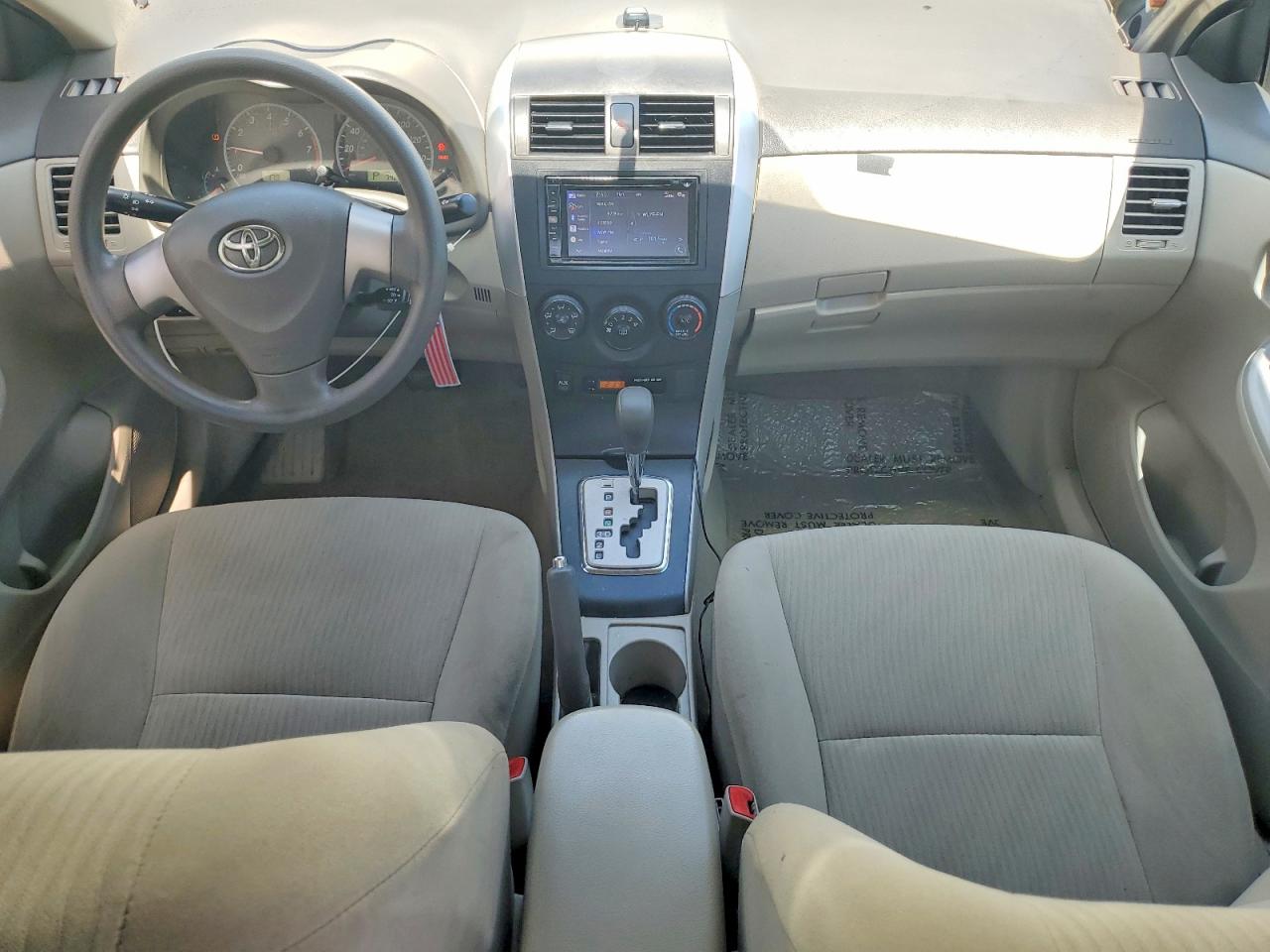 2010 Toyota Corolla Le Gold vin: 2T1BU4EE0AC520750
