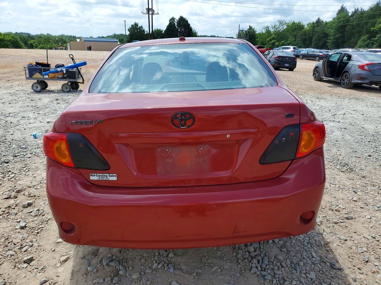 2010 Toyota Corolla Le Red vin: 2T1BU4EE0AC523437