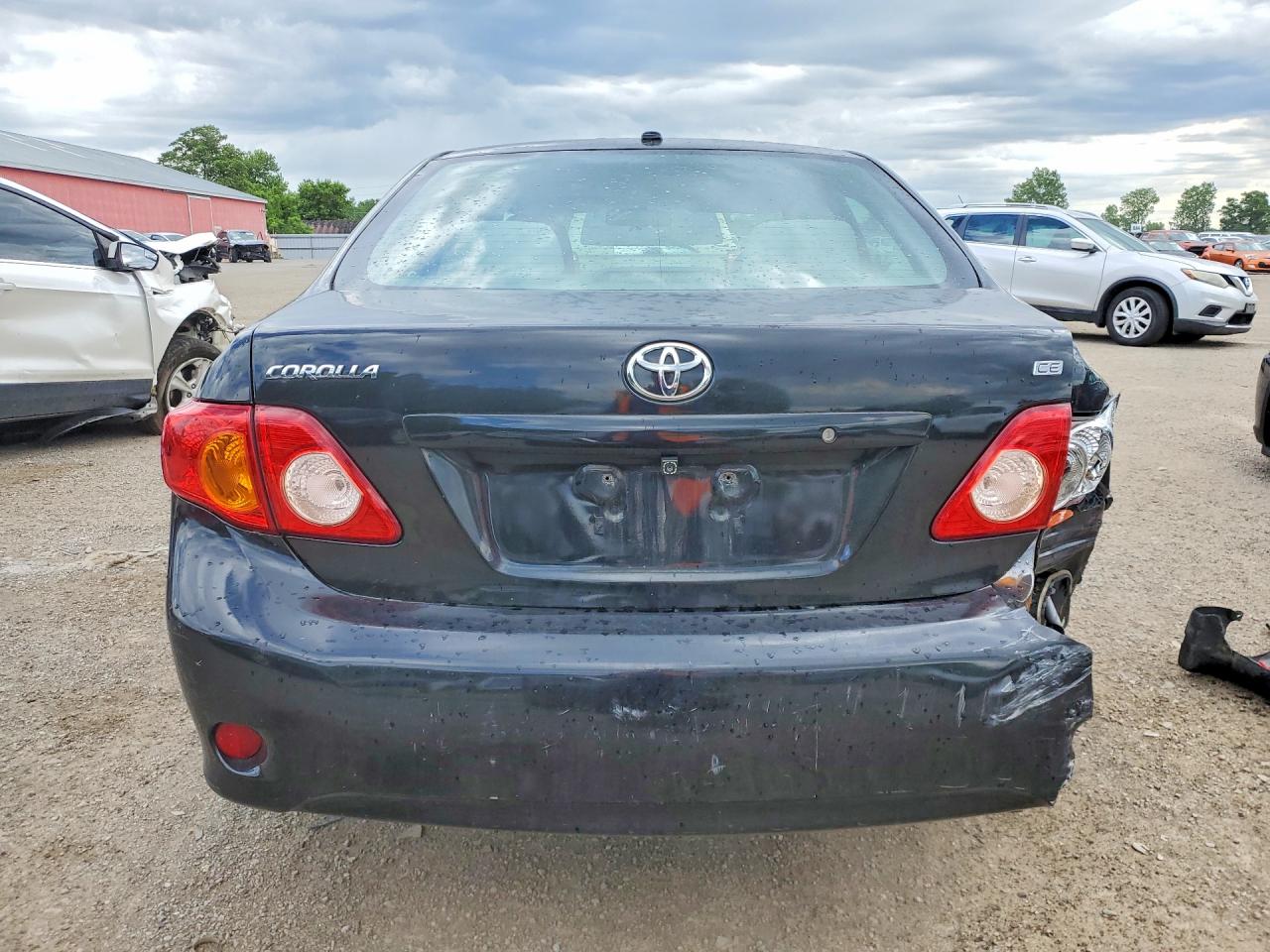 2010 Toyota Corolla Base Black vin: 2T1BU4EE1AC216018