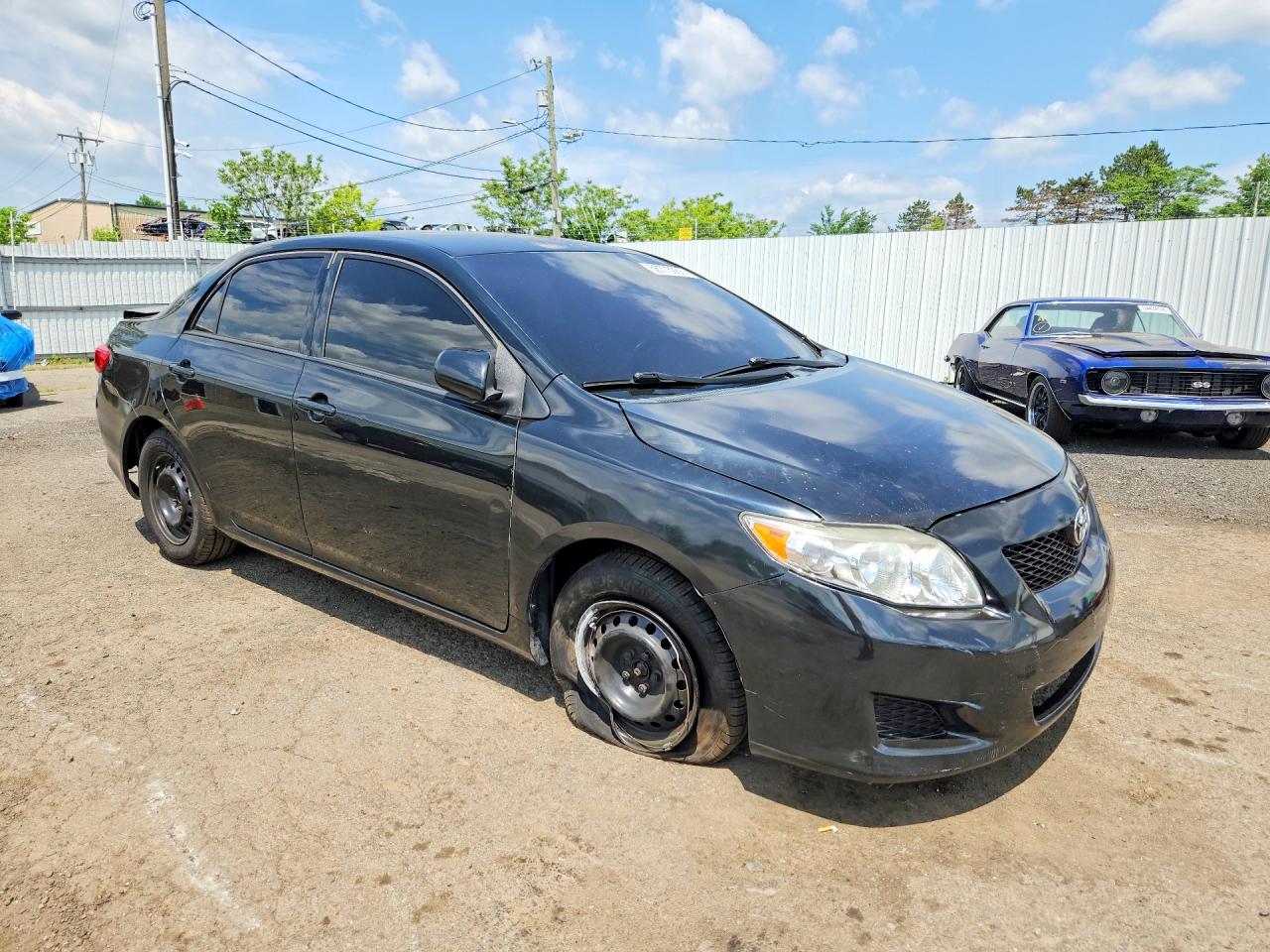 2010 Toyota Corolla Le Black vin: 2T1BU4EE1AC292998