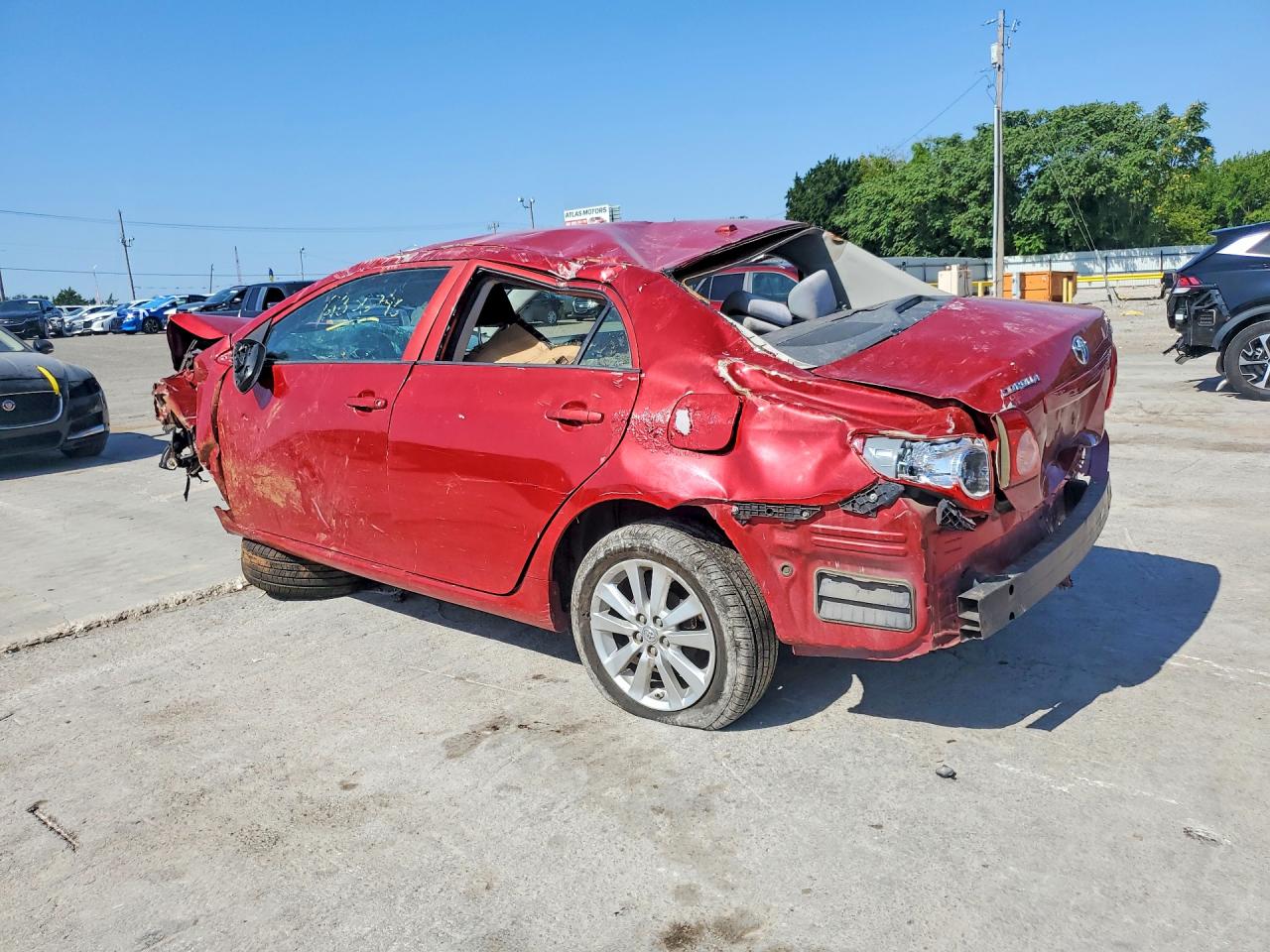 2010 Toyota Corolla Le Red vin: 2T1BU4EE1AC365674