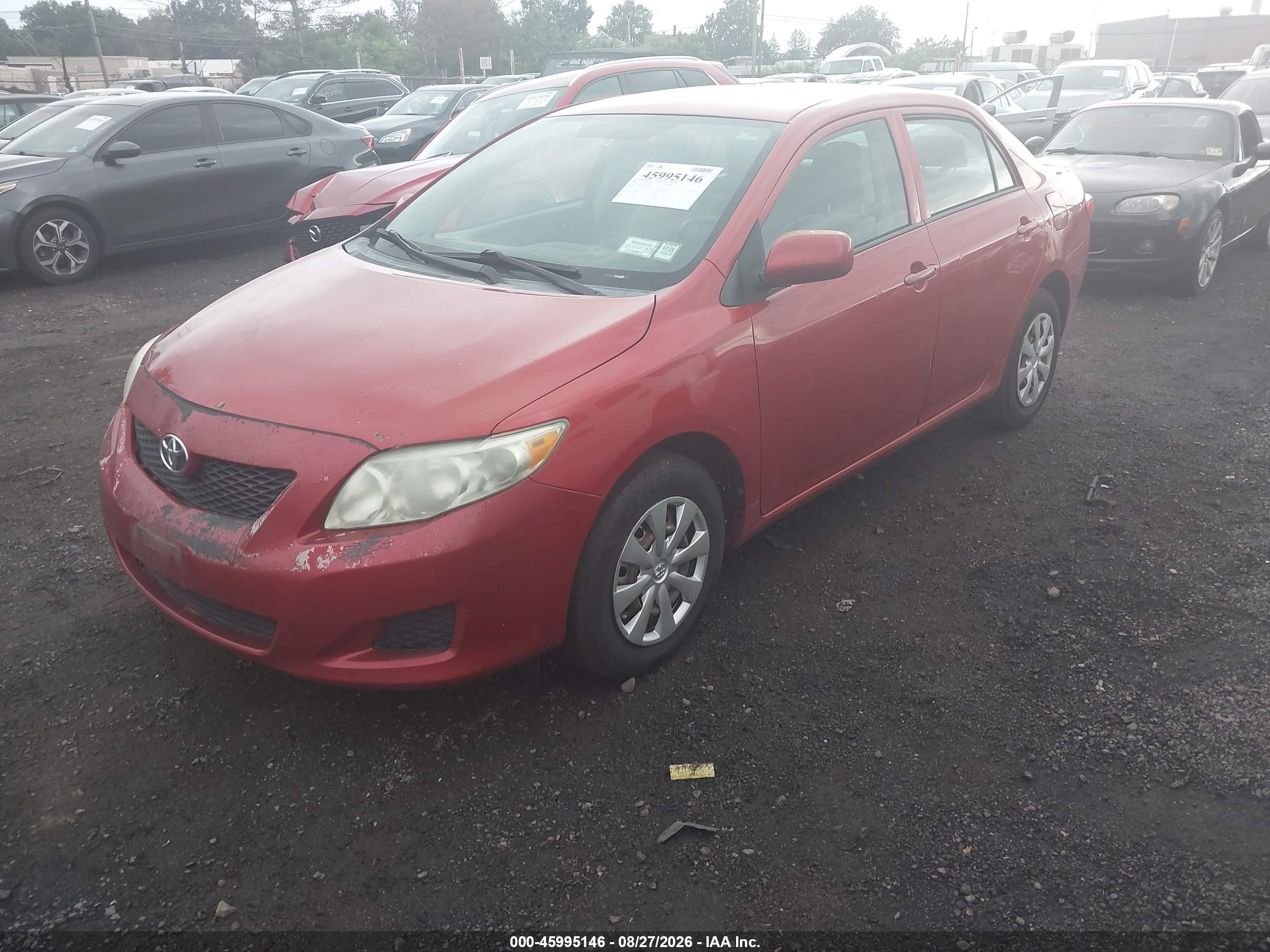 2010 Toyota Corolla Le Red vin: 2T1BU4EE1AC384189