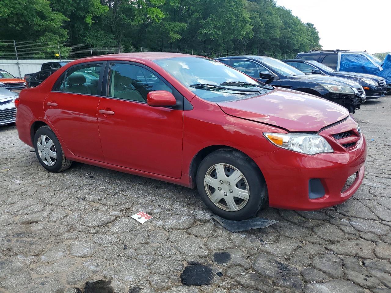 2011 Toyota Corolla Le Red vin: 2T1BU4EE1BC543097