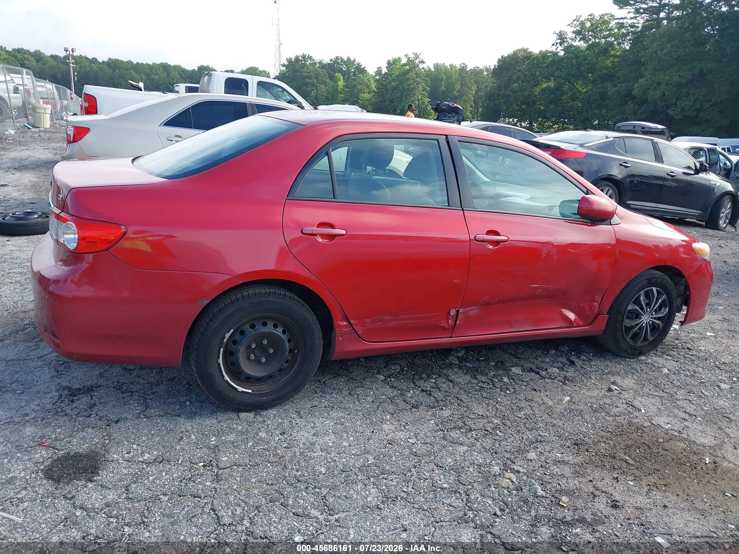 2011 Toyota Corolla Le Red vin: 2T1BU4EE1BC557677