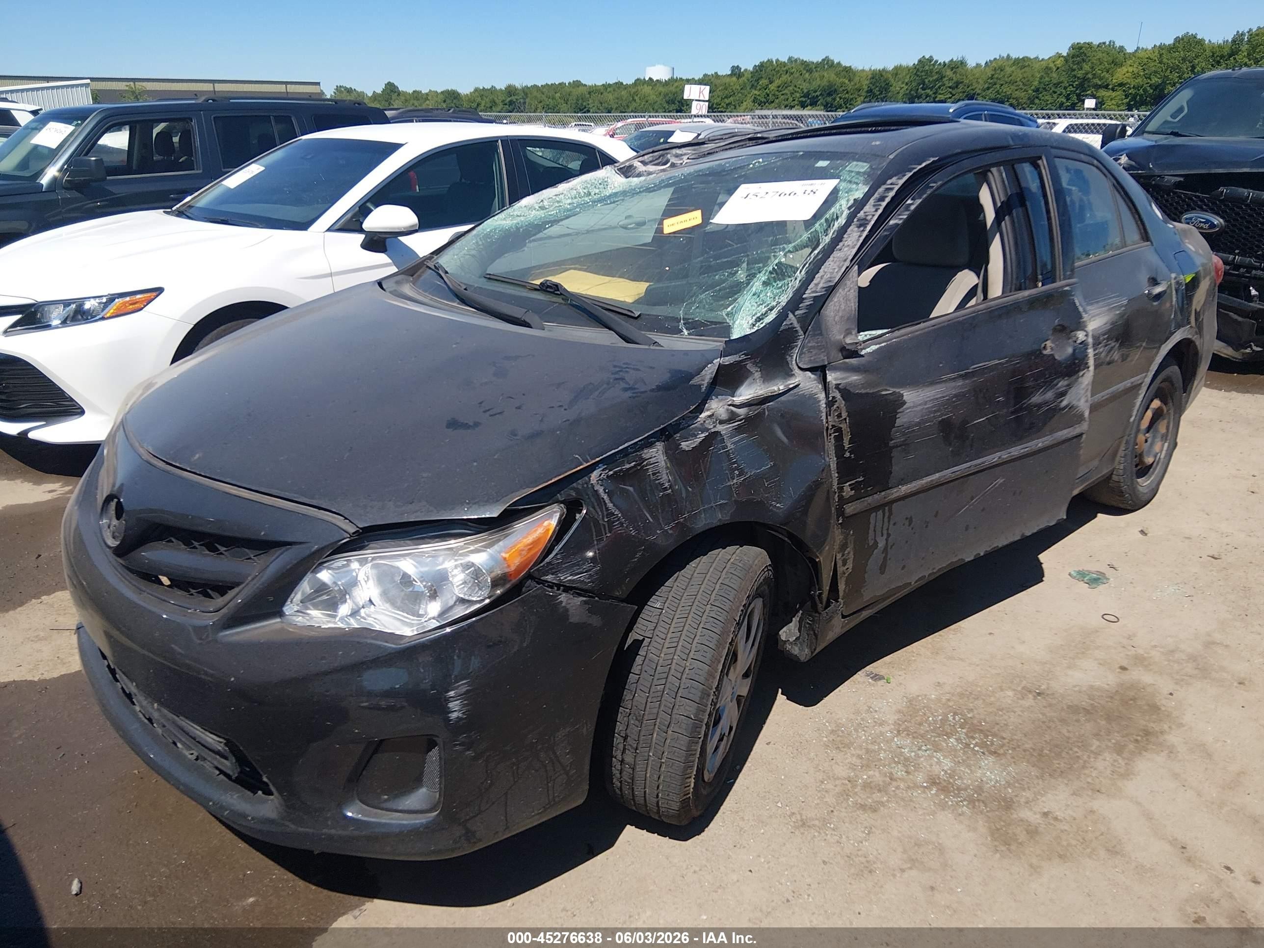 2011 Toyota Corolla Le Black vin: 2T1BU4EE1BC637108