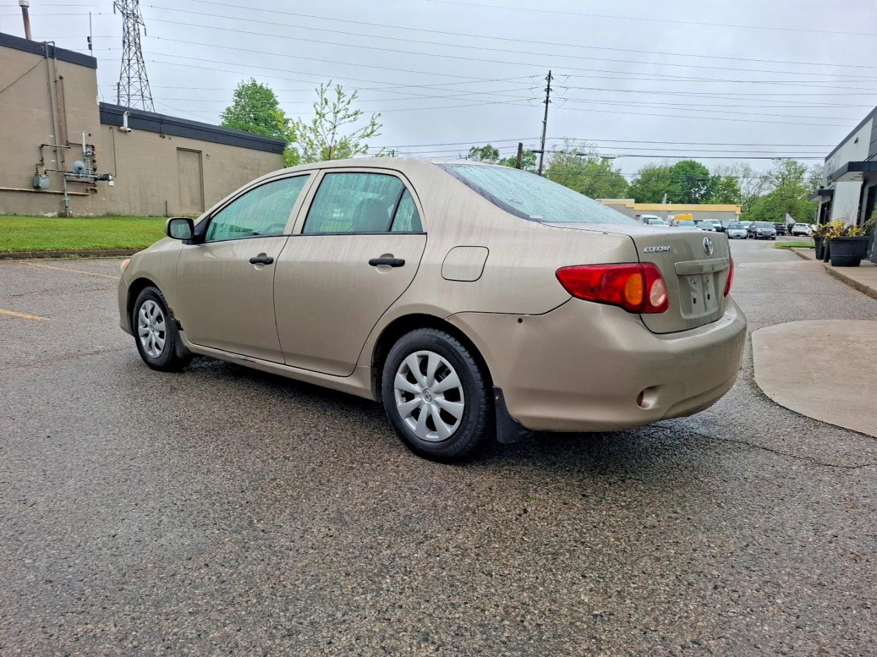 2010 Toyota Corolla Base Gold vin: 2T1BU4EE2AC252848