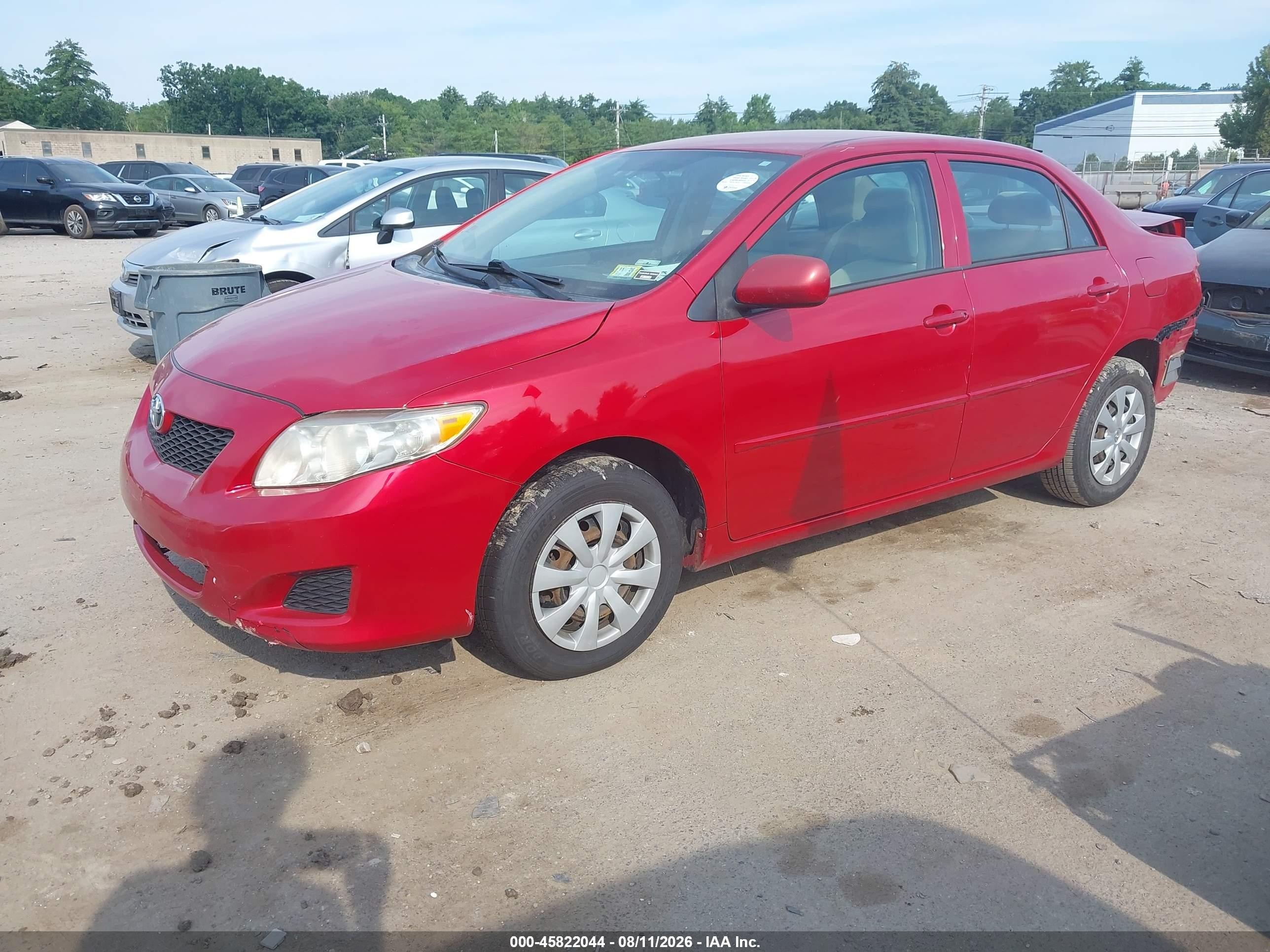2010 Toyota Corolla Le Red vin: 2T1BU4EE2AC260707