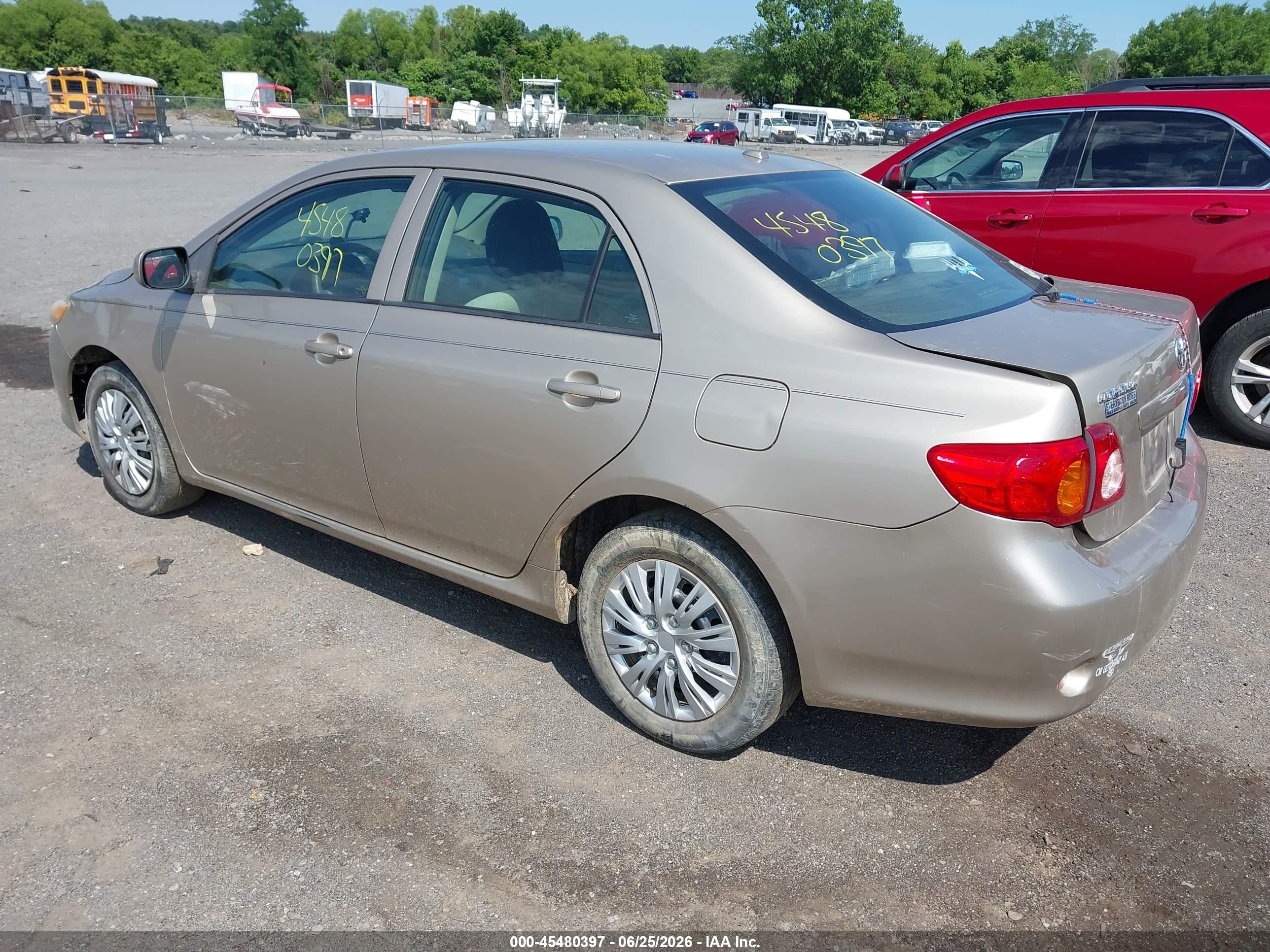 2010 Toyota Corolla Le Champagne vin: 2T1BU4EE2AC384847