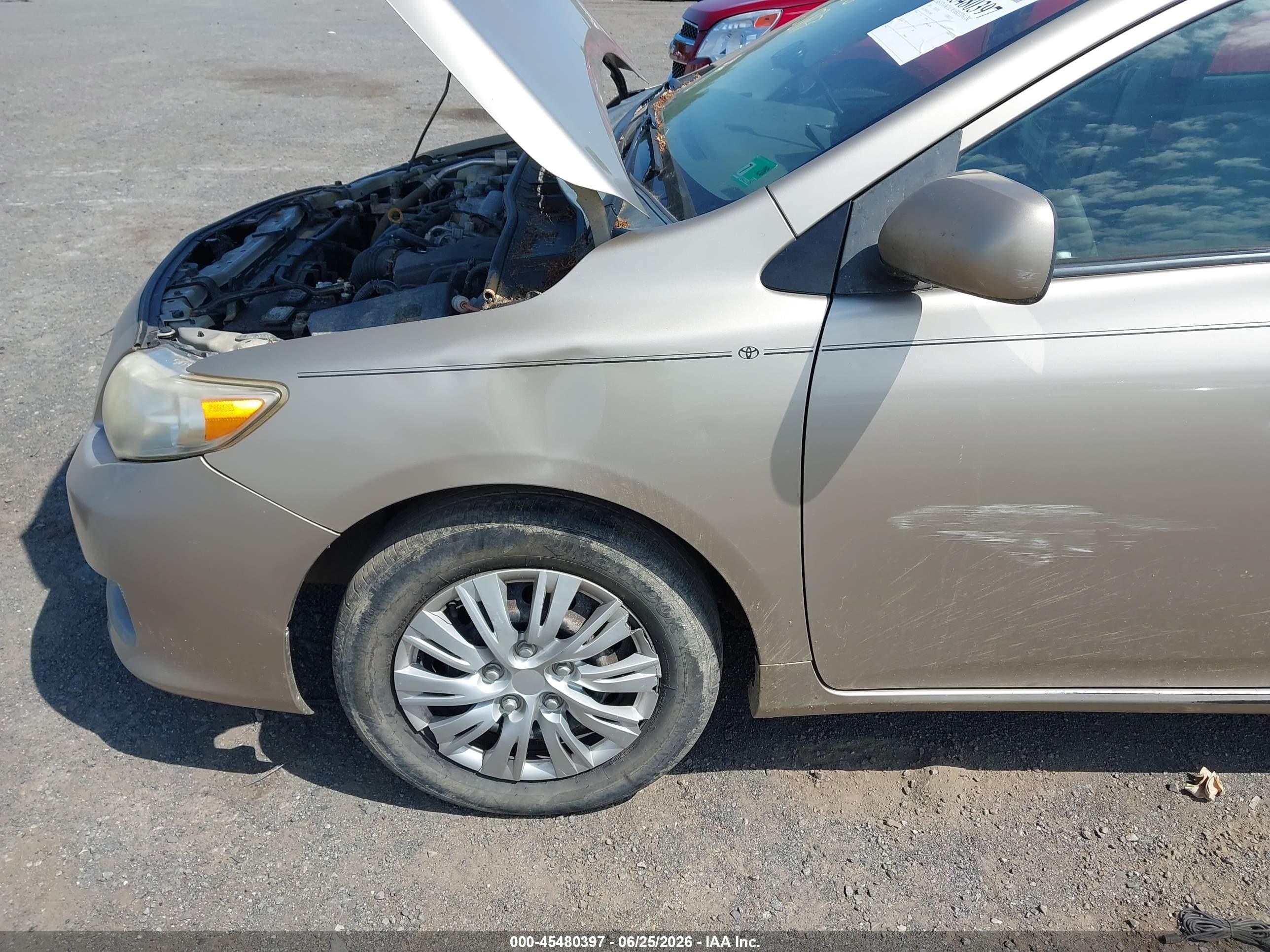 2010 Toyota Corolla Le Champagne vin: 2T1BU4EE2AC384847