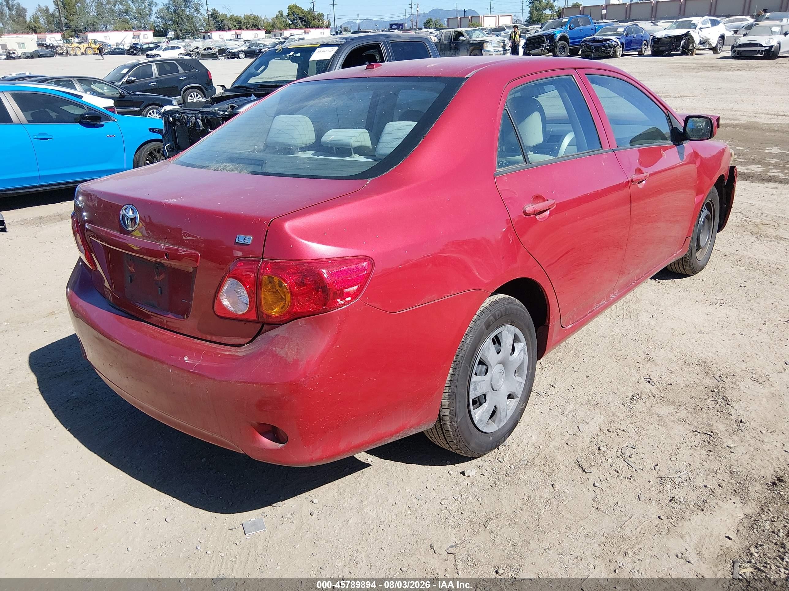 2010 Toyota Corolla Le Red vin: 2T1BU4EE2AC405003