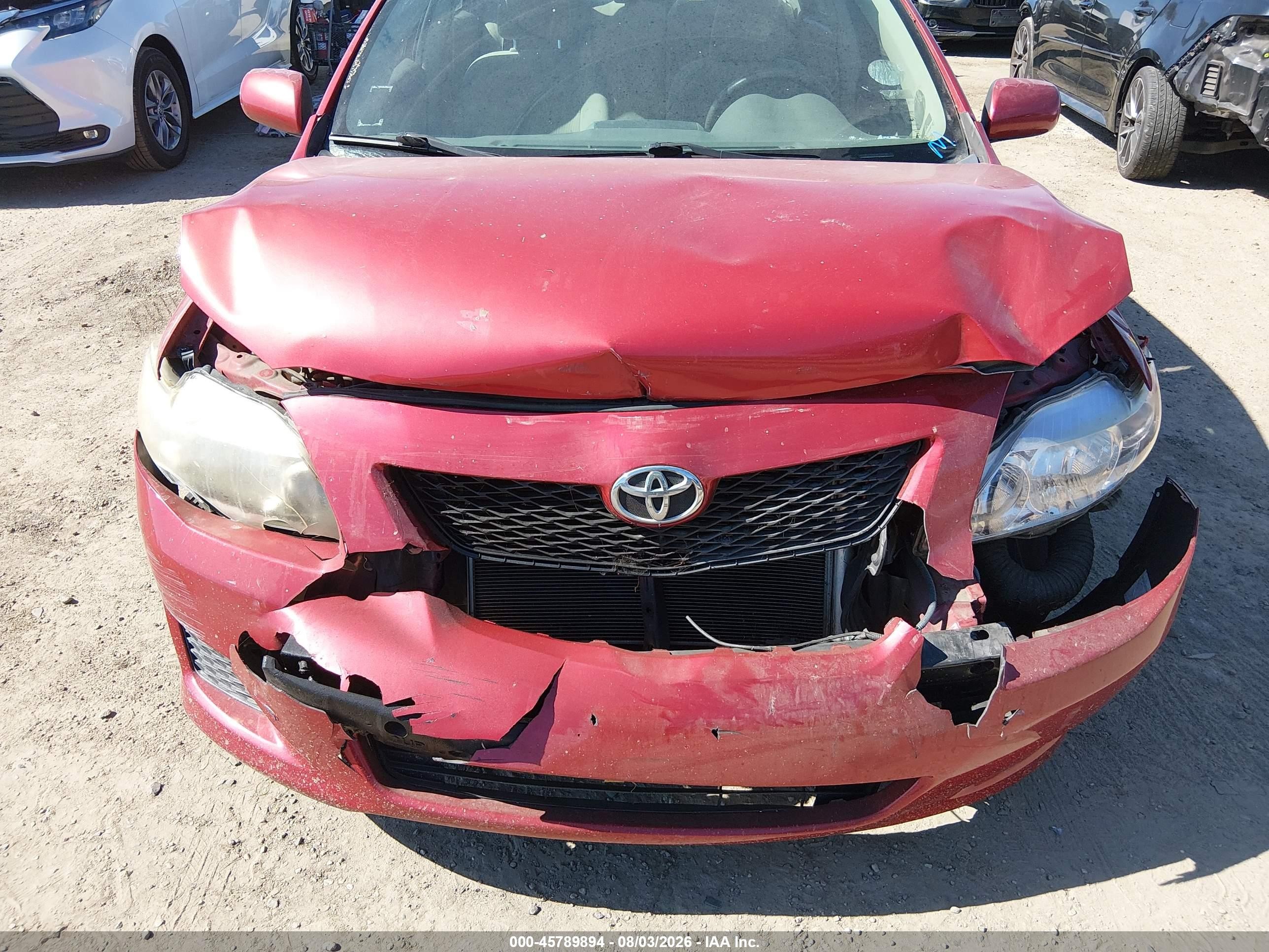 2010 Toyota Corolla Le Red vin: 2T1BU4EE2AC405003