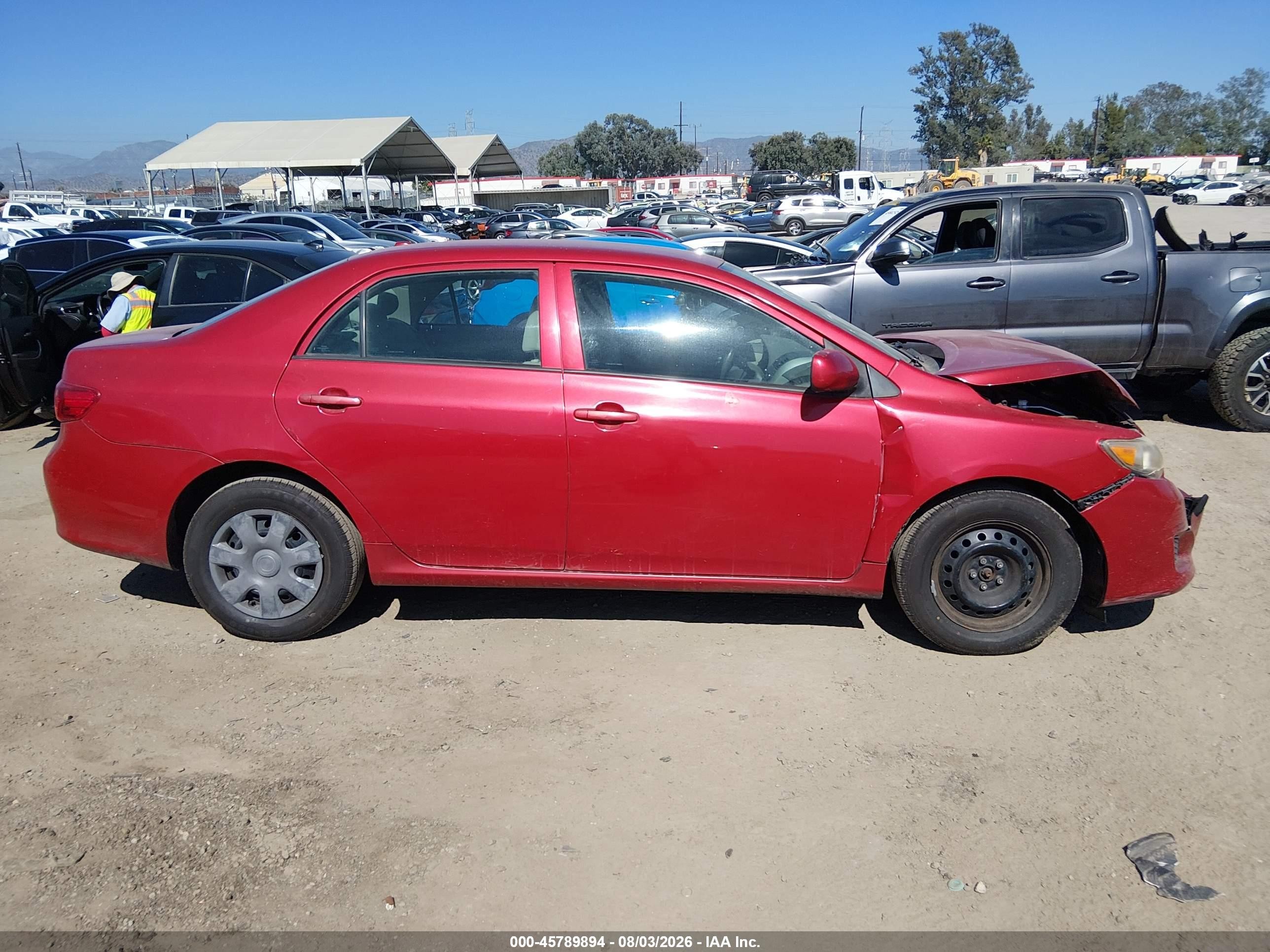 2010 Toyota Corolla Le Red vin: 2T1BU4EE2AC405003