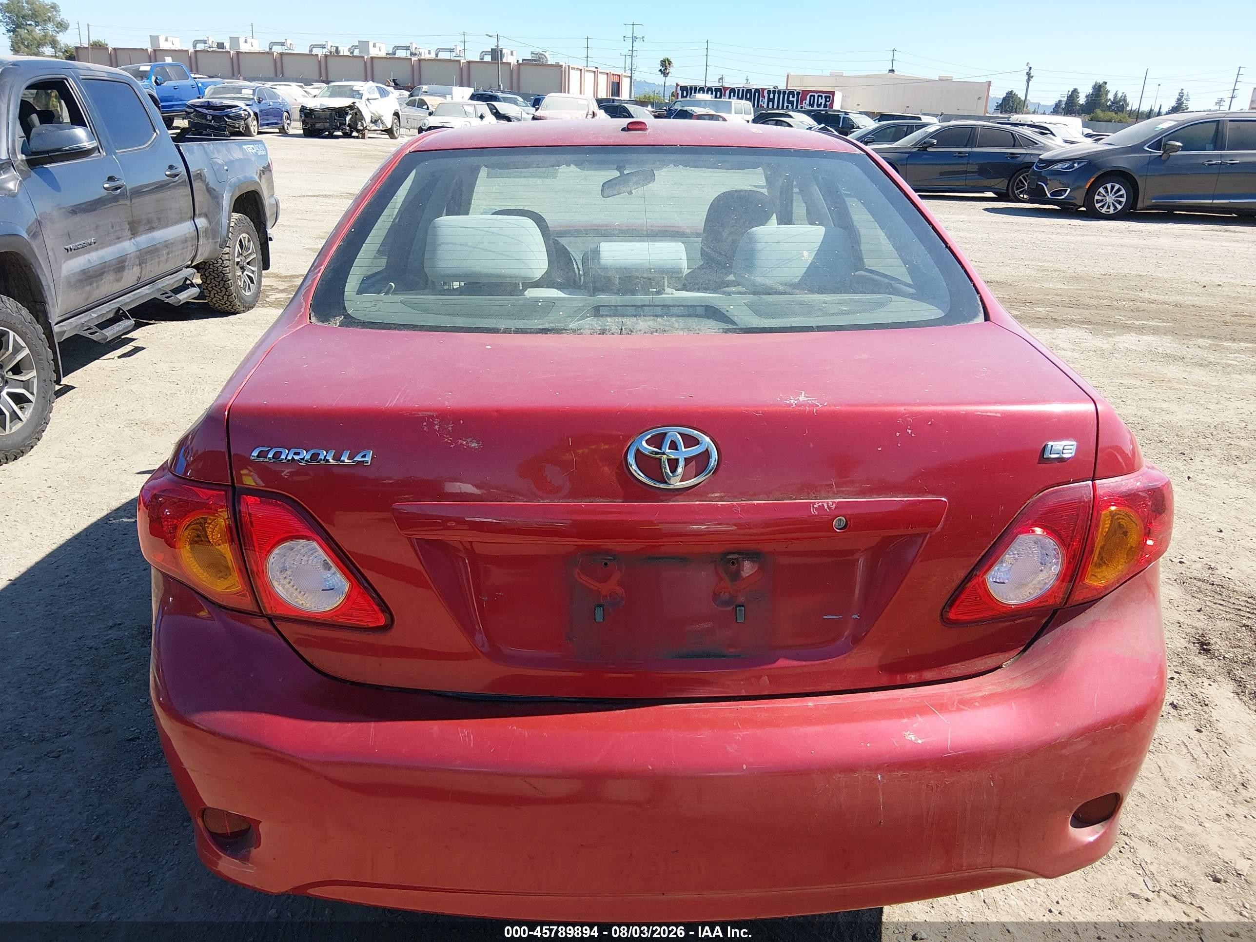 2010 Toyota Corolla Le Red vin: 2T1BU4EE2AC405003