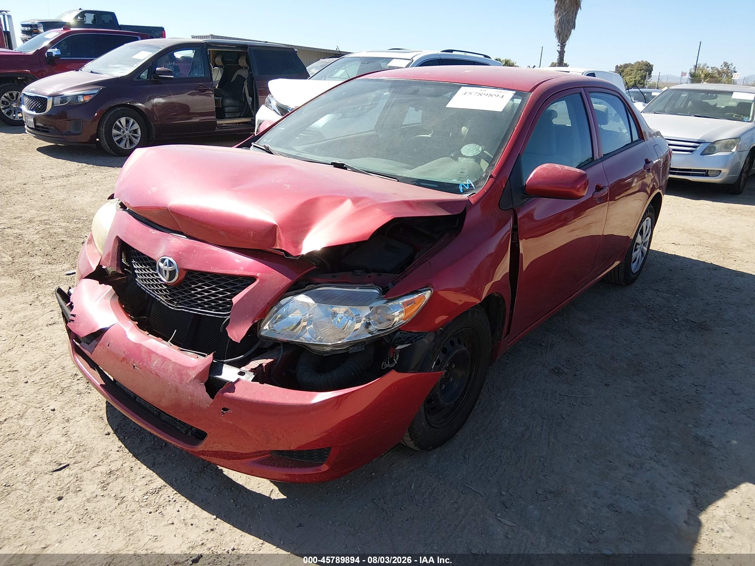 2010 Toyota Corolla Le Red vin: 2T1BU4EE2AC405003