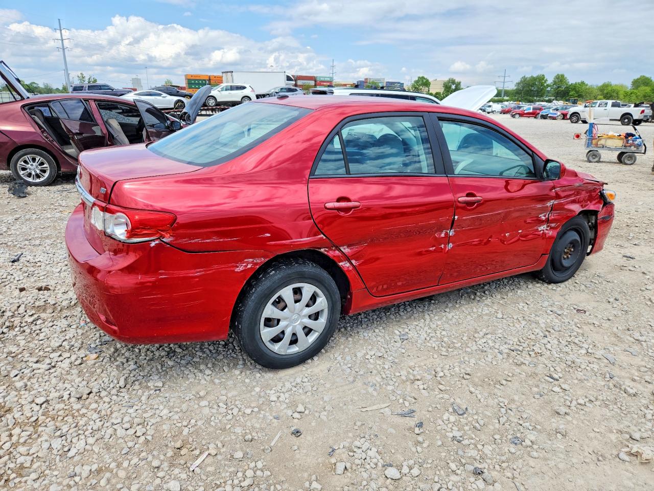 2011 Toyota Corolla Le Red vin: 2T1BU4EE2BC570048