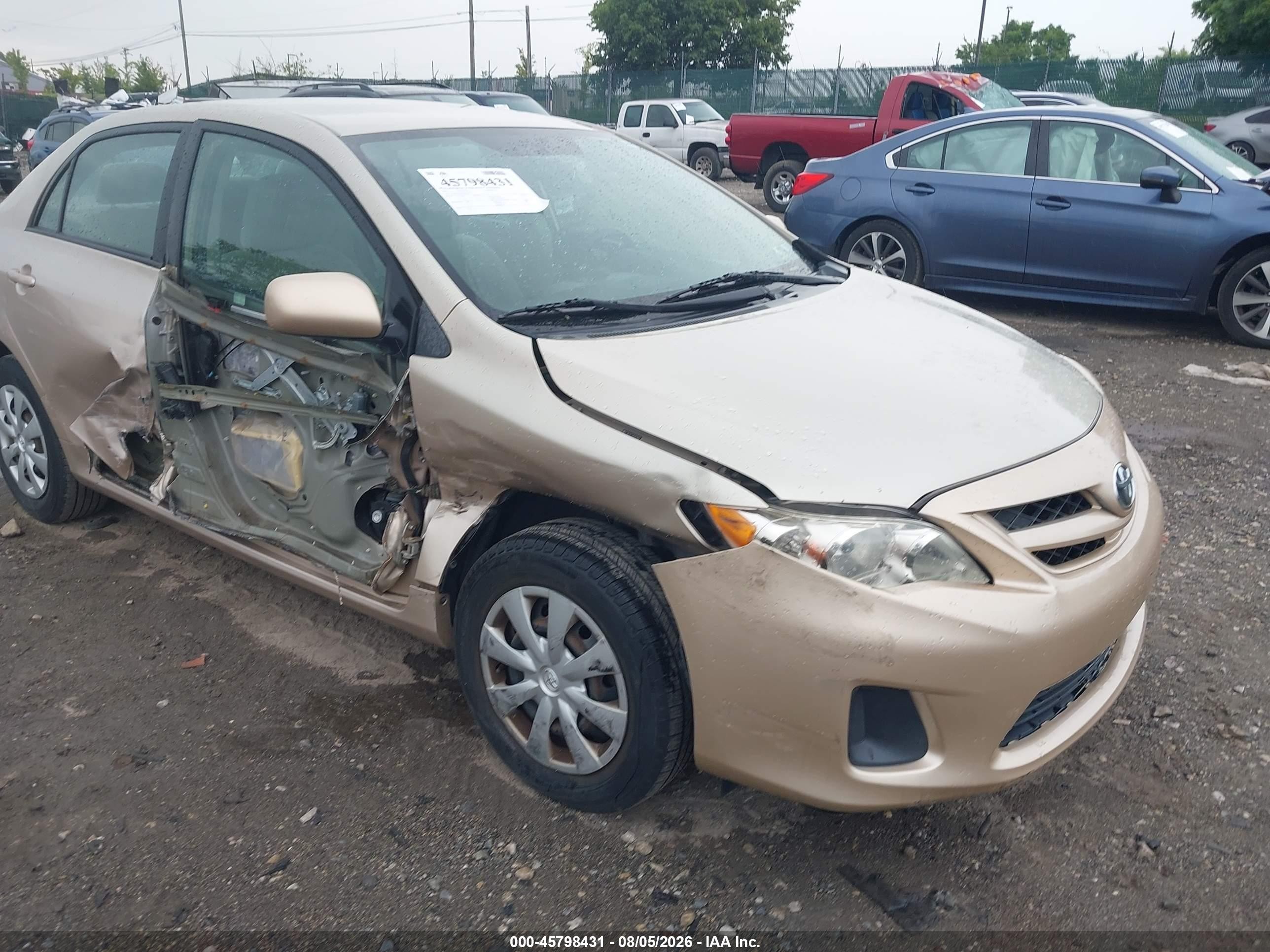 2011 Toyota Corolla Le Gold vin: 2T1BU4EE2BC661093