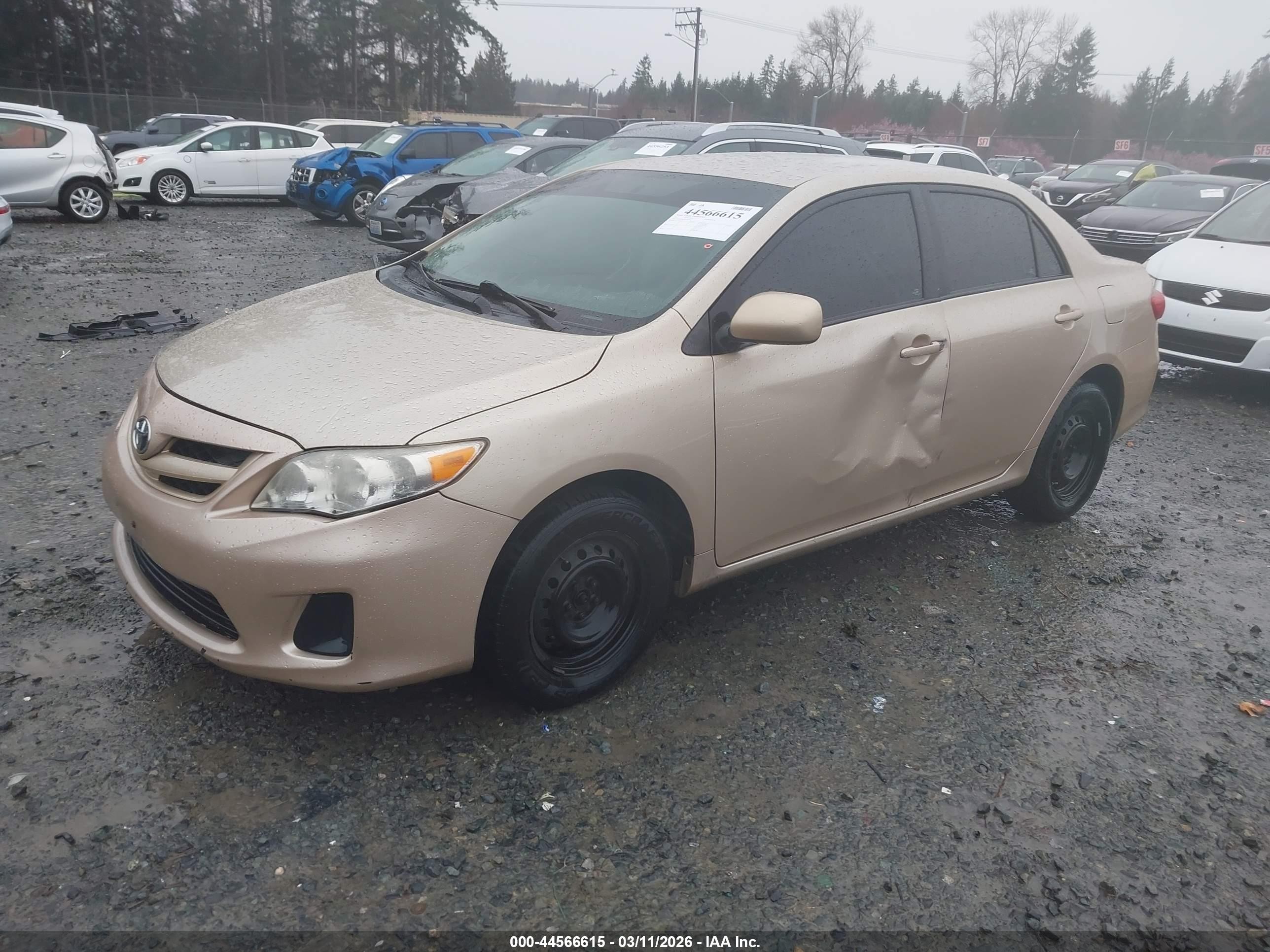 2011 Toyota Corolla Le Gold vin: 2T1BU4EE2BC682896