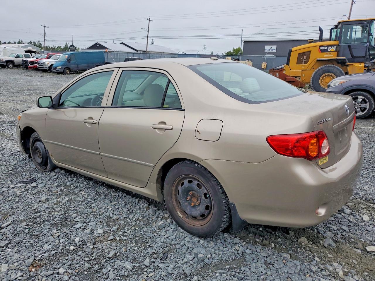 2010 Toyota Corolla Base Золотой vin: 2T1BU4EE3AC193552