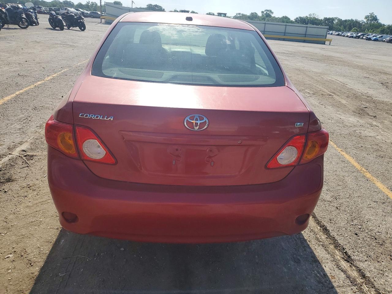 2010 Toyota Corolla Le Red vin: 2T1BU4EE3AC270081