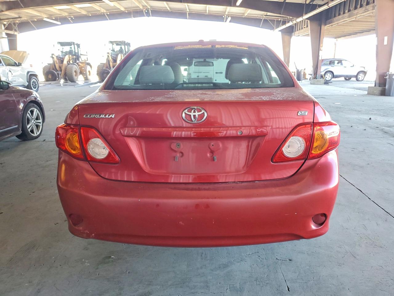 2010 Toyota Corolla Le Red vin: 2T1BU4EE3AC397347