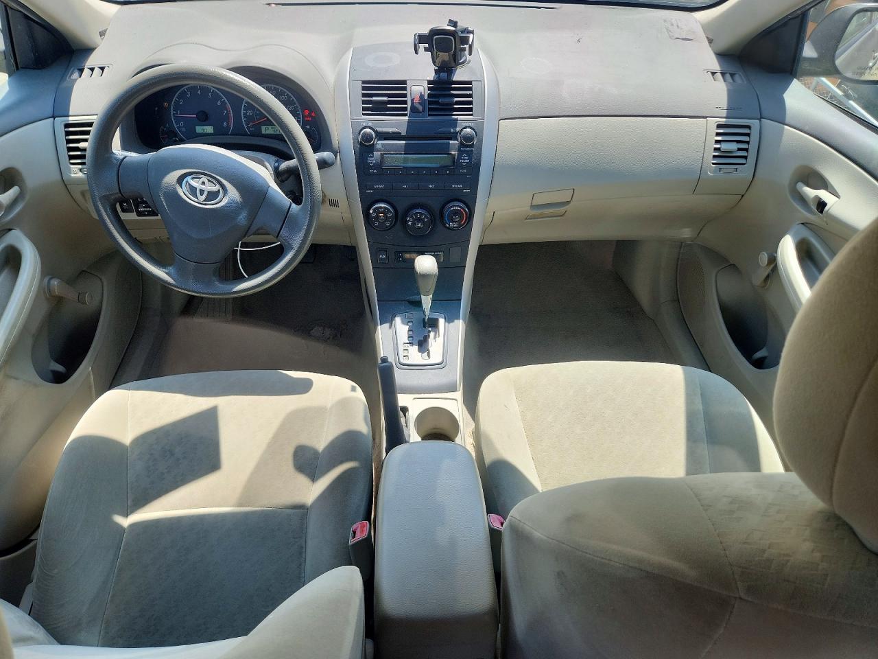 2010 Toyota Corolla Base Tan vin: 2T1BU4EE3AC522993