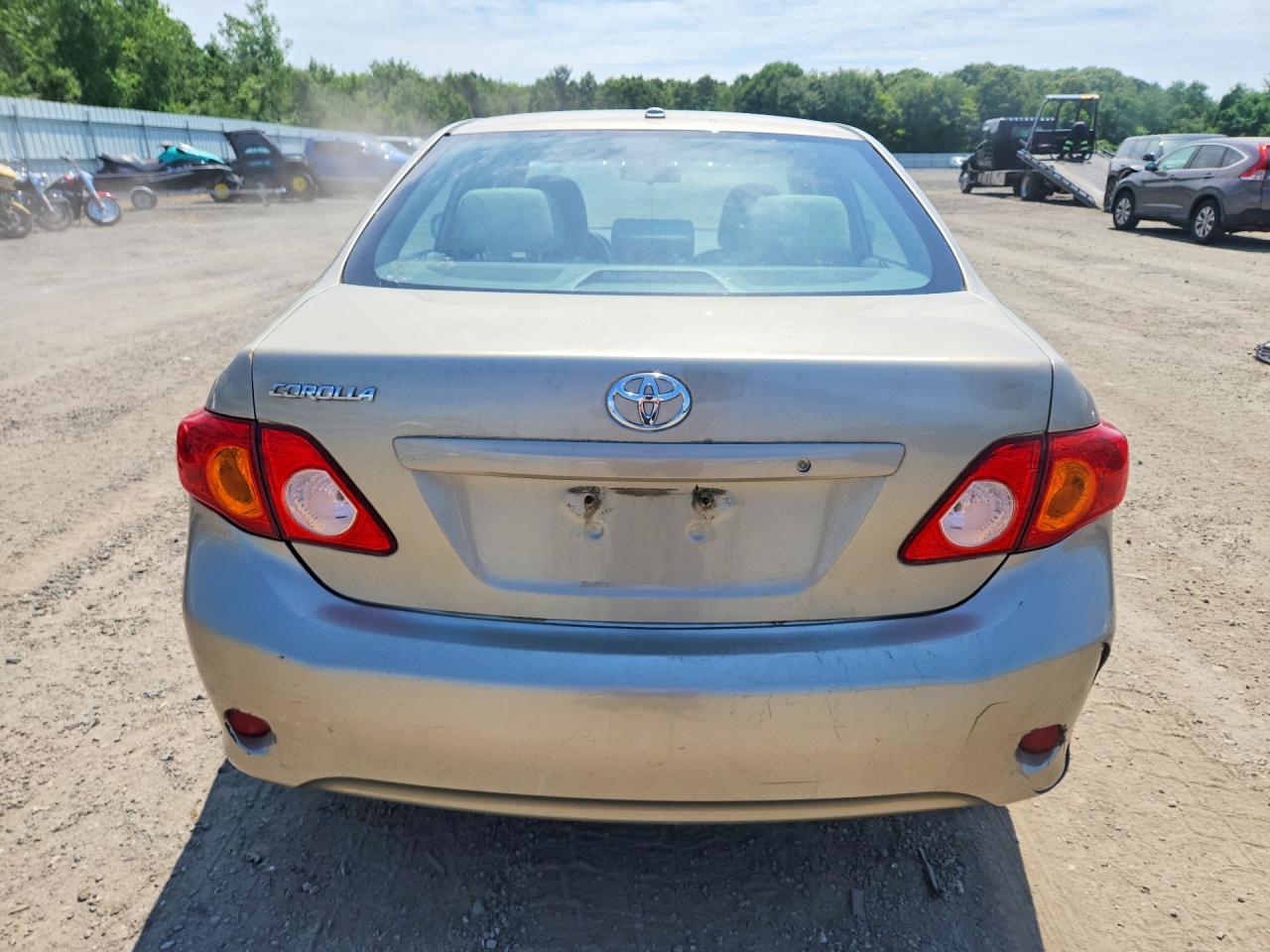 2010 Toyota Corolla Base Tan vin: 2T1BU4EE3AC522993