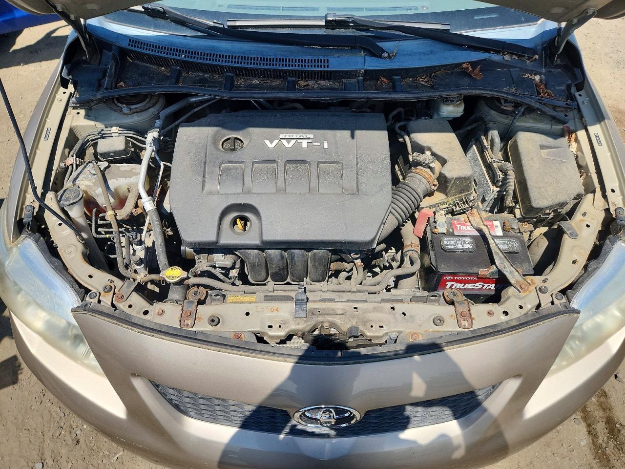 2010 Toyota Corolla Base Tan vin: 2T1BU4EE3AC522993
