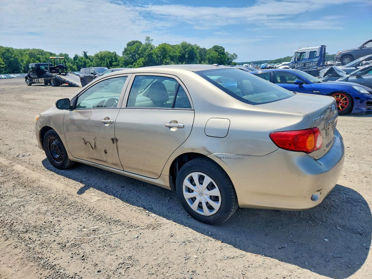 2010 Toyota Corolla Base Tan vin: 2T1BU4EE3AC522993