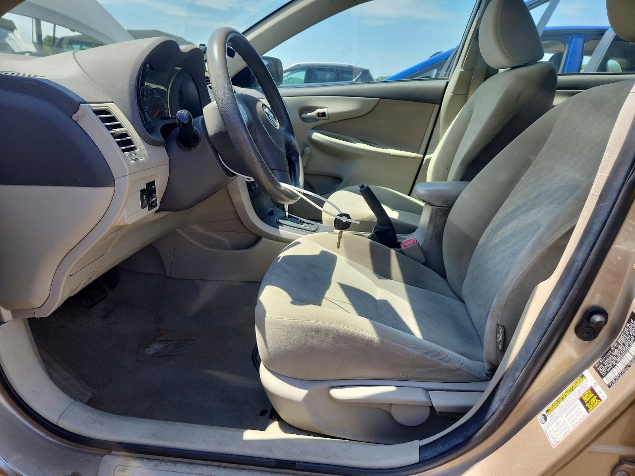 2010 Toyota Corolla Base Tan vin: 2T1BU4EE3AC522993