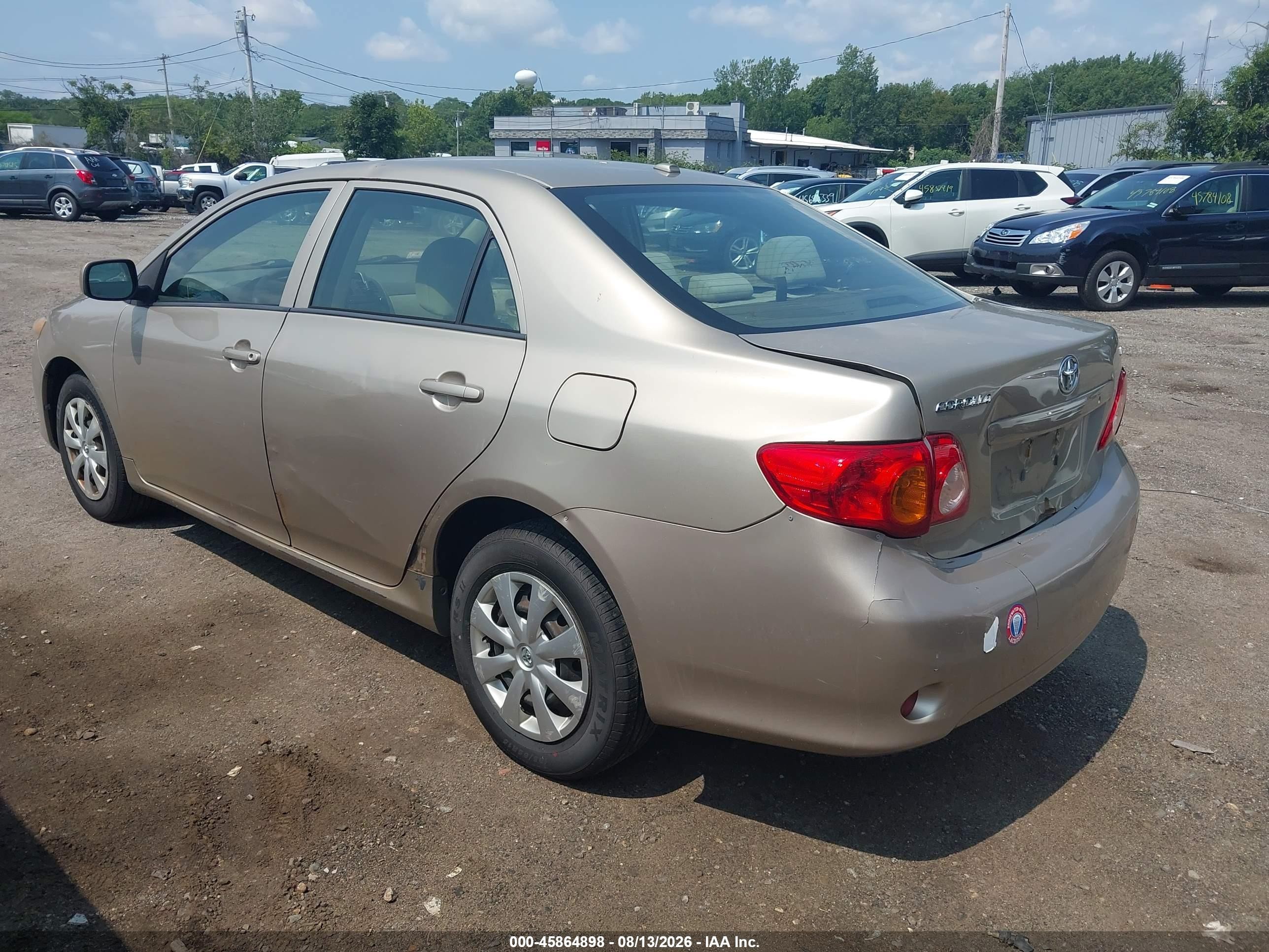 2010 Toyota Corolla Le Gold vin: 2T1BU4EE4AC263933