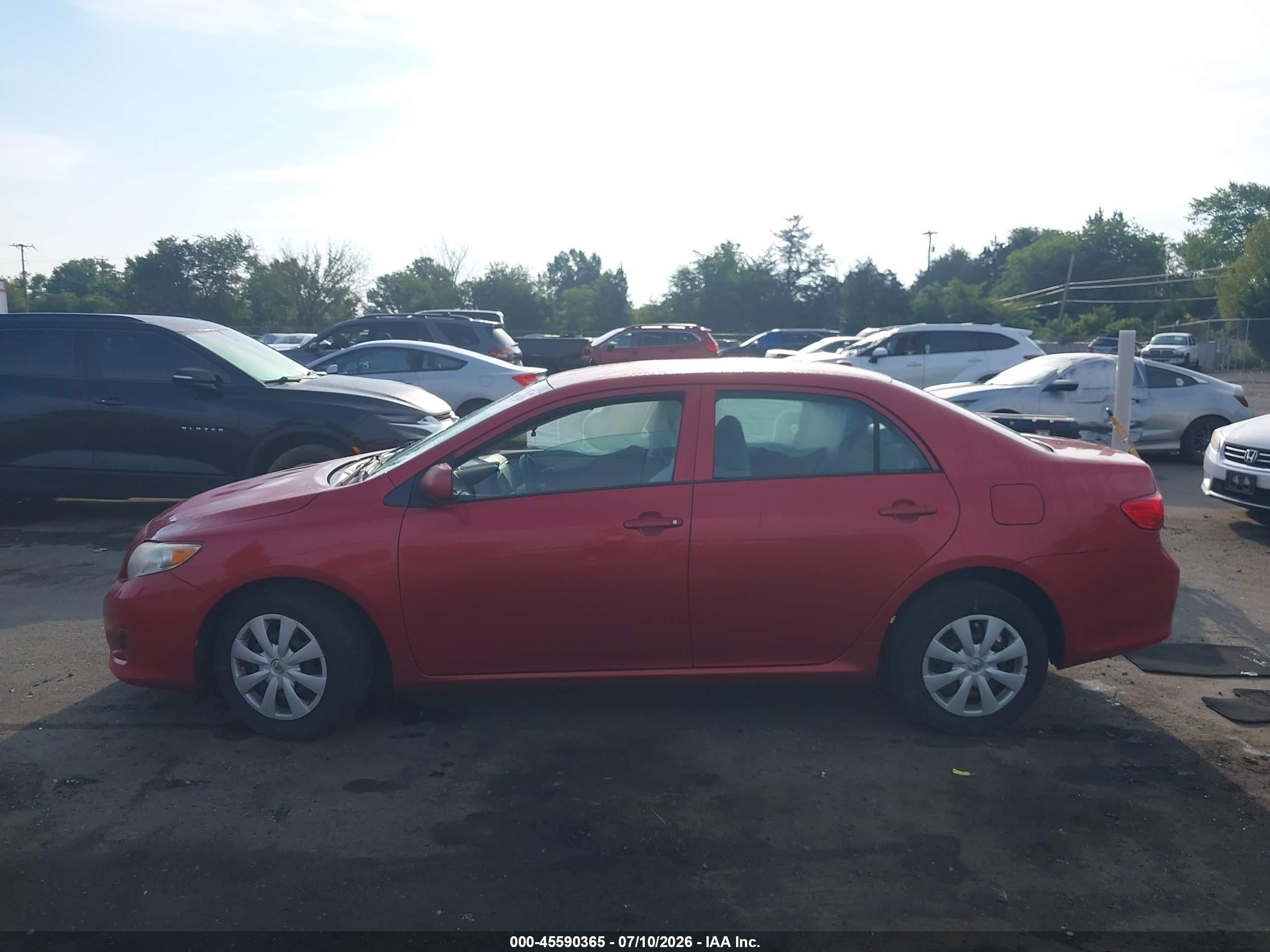 2010 Toyota Corolla Le Red vin: 2T1BU4EE4AC295927